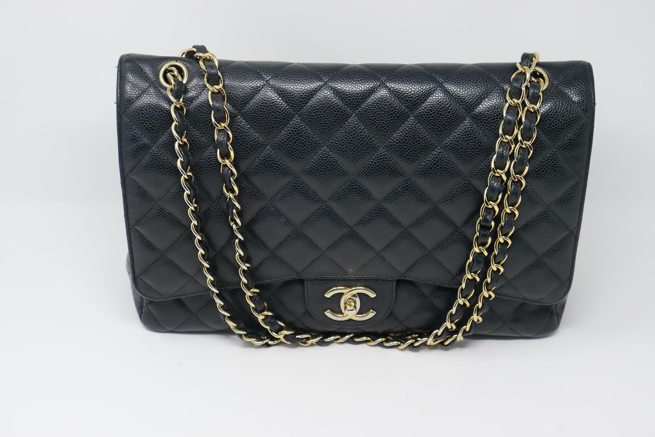Women's or Men's CHANEL Black Caviar Maxi Double Flap Bag For Sale