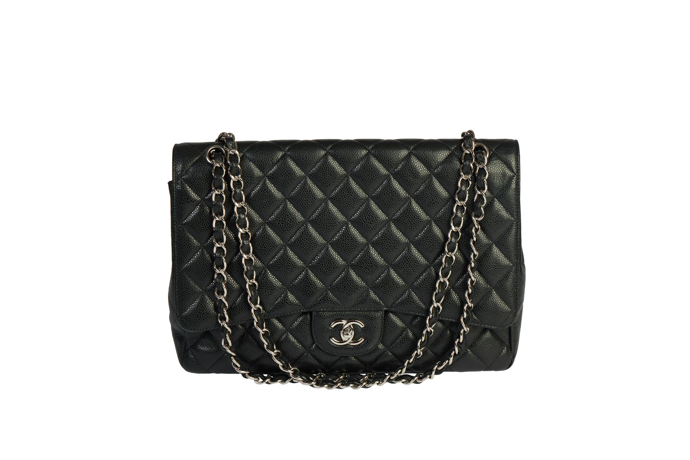 Chanel black quilted caviar single maxi flap with silver tone hardware. Collection 2010. Shoulder drop 11