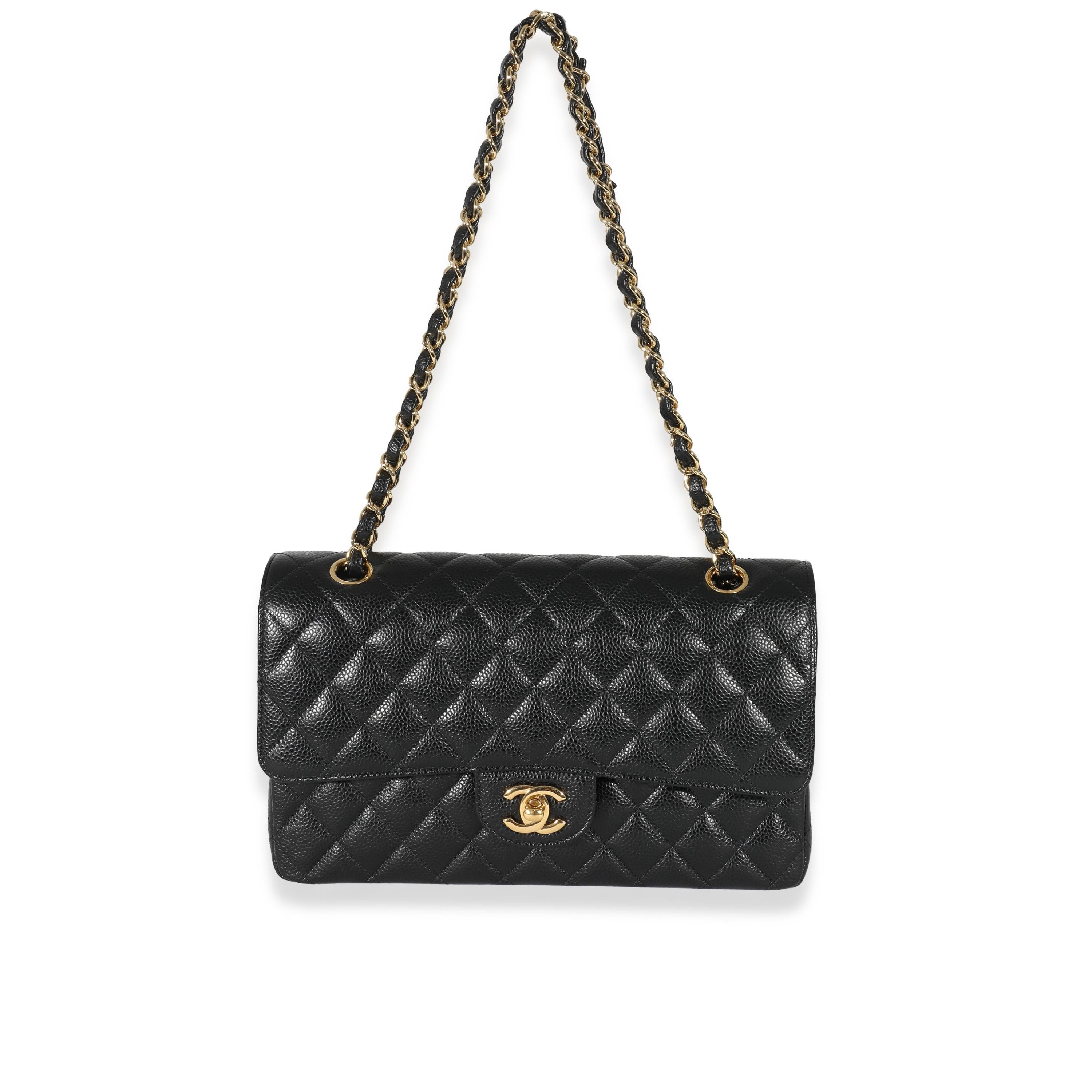 Listing Title: Chanel Black Caviar Medium Classic Double Flap Bag
SKU: 132549
Condition: Pre-owned 
Handbag Condition: Excellent
Condition Comments: Item is in excellent condition and displays light signs of wear. Light creasing along leather.