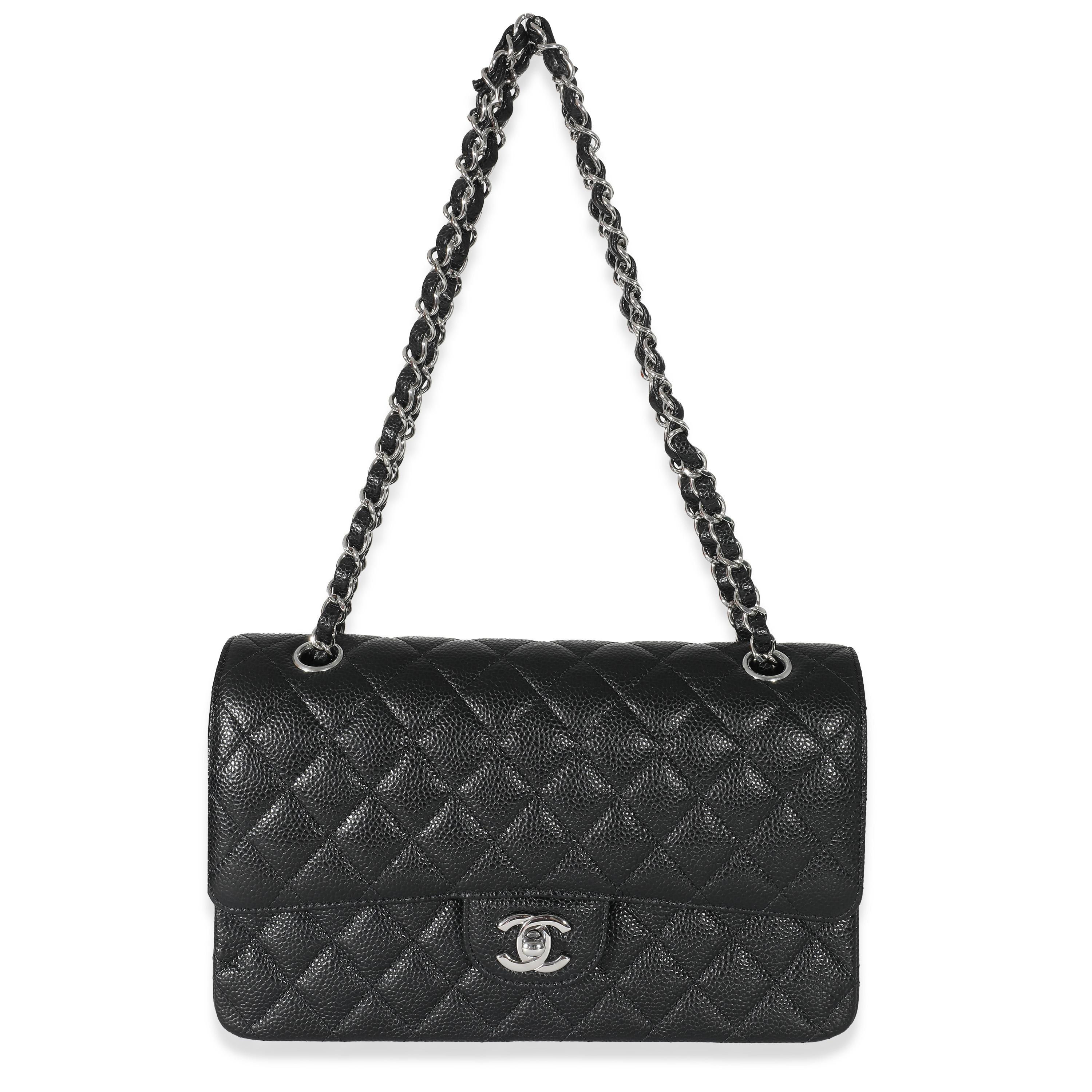 Listing Title: Chanel Black Caviar Medium Classic Double Flap Bag
SKU: 131428
MSRP: 10200.00 USD
Condition: Pre-owned 
Condition Description: A timeless classic that never goes out of style, the flap bag from Chanel dates back to 1955 and has seen a