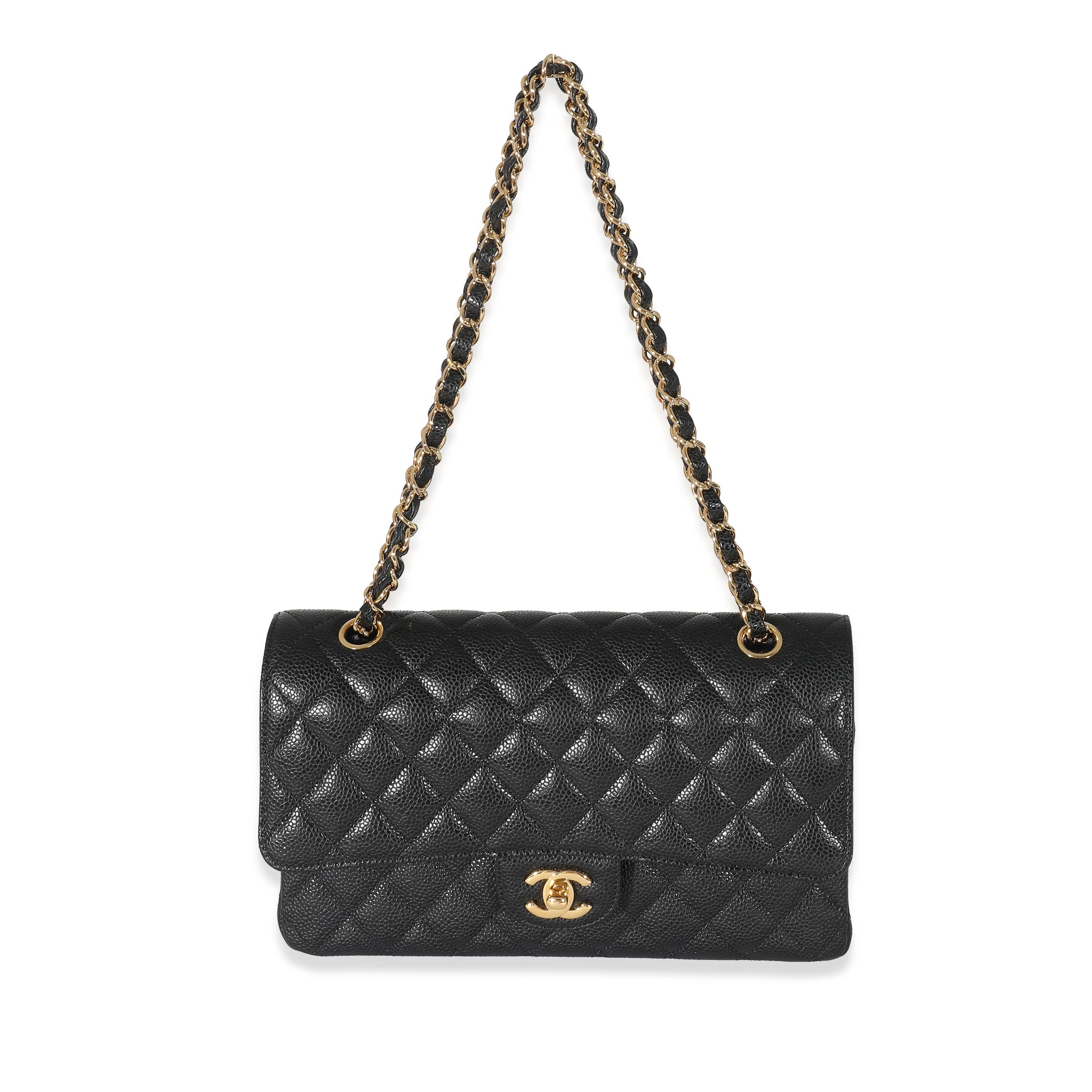 Listing Title: Chanel Black Caviar Medium Classic Double Flap Bag
SKU: 134003
MSRP: 10200.00 USD
Condition: Pre-owned 
Handbag Condition: Very Good
Condition Comments: Item is in very good condition with minor signs of wear. Exterior light corner