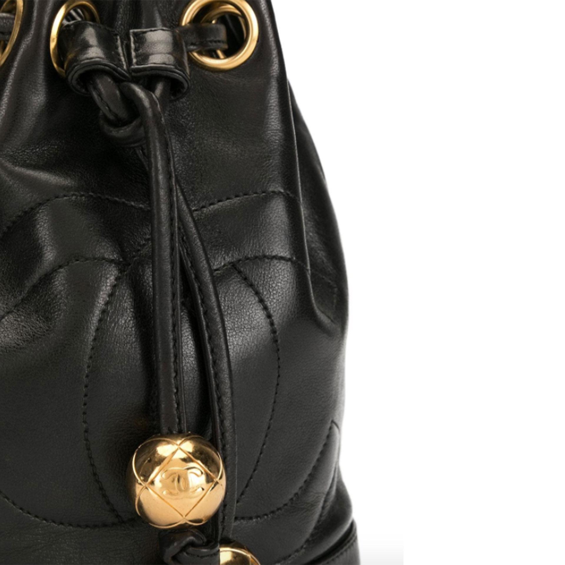 Women's or Men's Chanel Black Caviar Mini CC Drawstring Gold Hardware Shoulder Bag For Sale