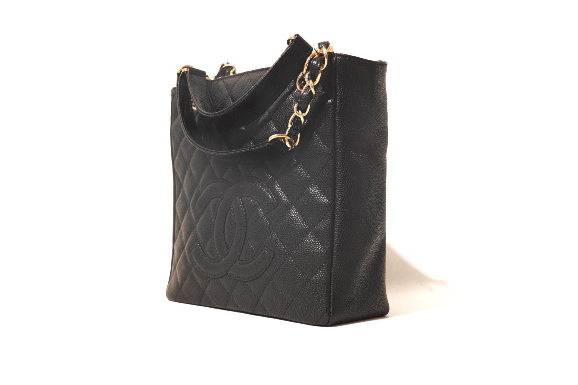 This authentic Chanel Black Caviar Leather PST is in excellent plus condition.  Part of the Timeless Classics, the Petite Shopping Tote is the perfect companion for everyday enjoyment. 
Black caviar leather is durable and textured.  Quilted in