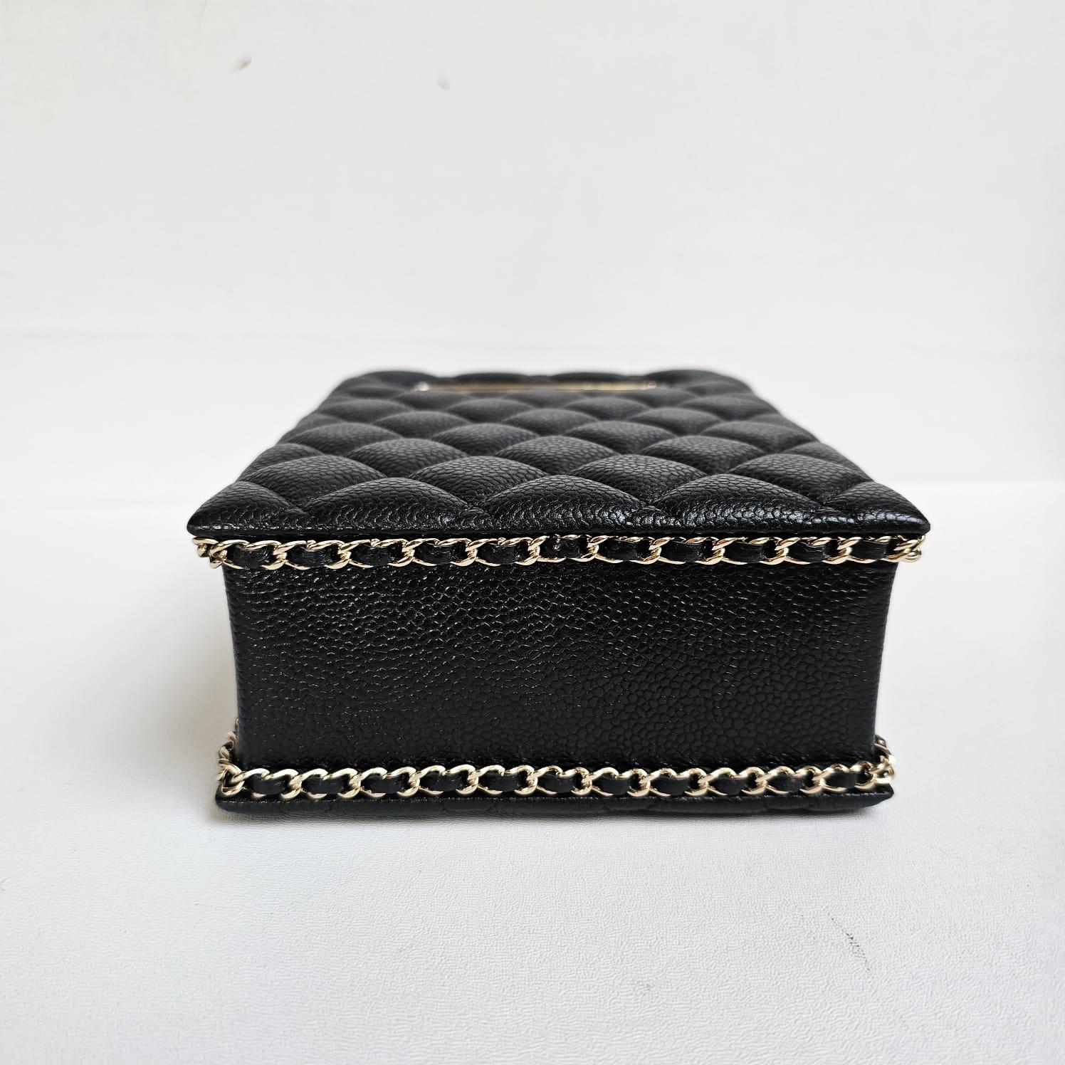 Rare chanel evening bag in black caviar leather. Overall still in excellent condition, very rarely worn. Slight scratches on the lambskin lining. Already chip. Comes with dust bag and box. Can be worn top handle or crossbody.