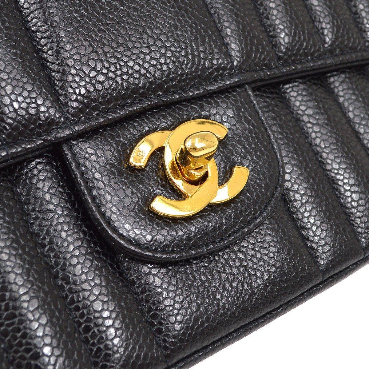 Pre-Owned Vintage Condition
From 1994 Collection
Caviar  Leather
Gold Tone Hardware
Leather Lining
Measures 9.75