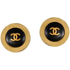Vintage Chanel Black CC Button earrings with Gold Surround