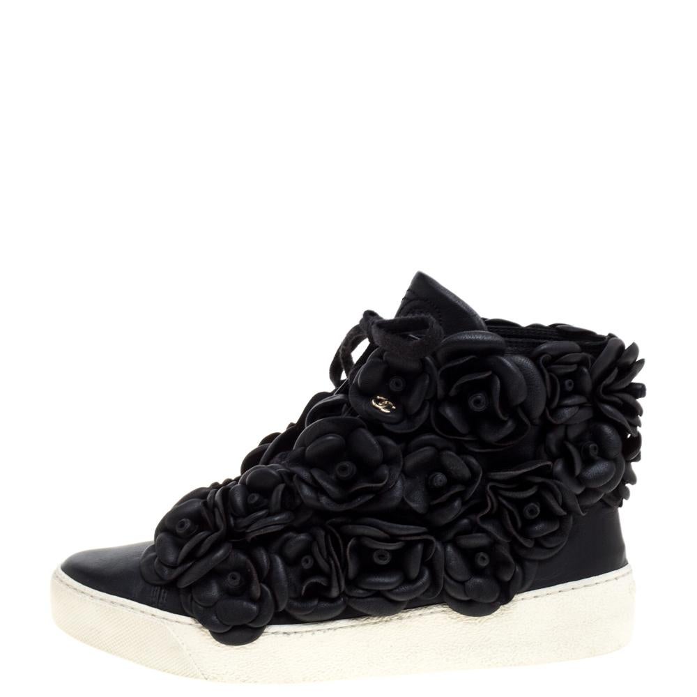 Your heart might skip a beat merely with a look at these gorgeous sneakers from Chanel. Blooming with the signature Camellia flower appliques all over, the sneakers are utterly feminine while also being comfortable and trend-relevant. They are