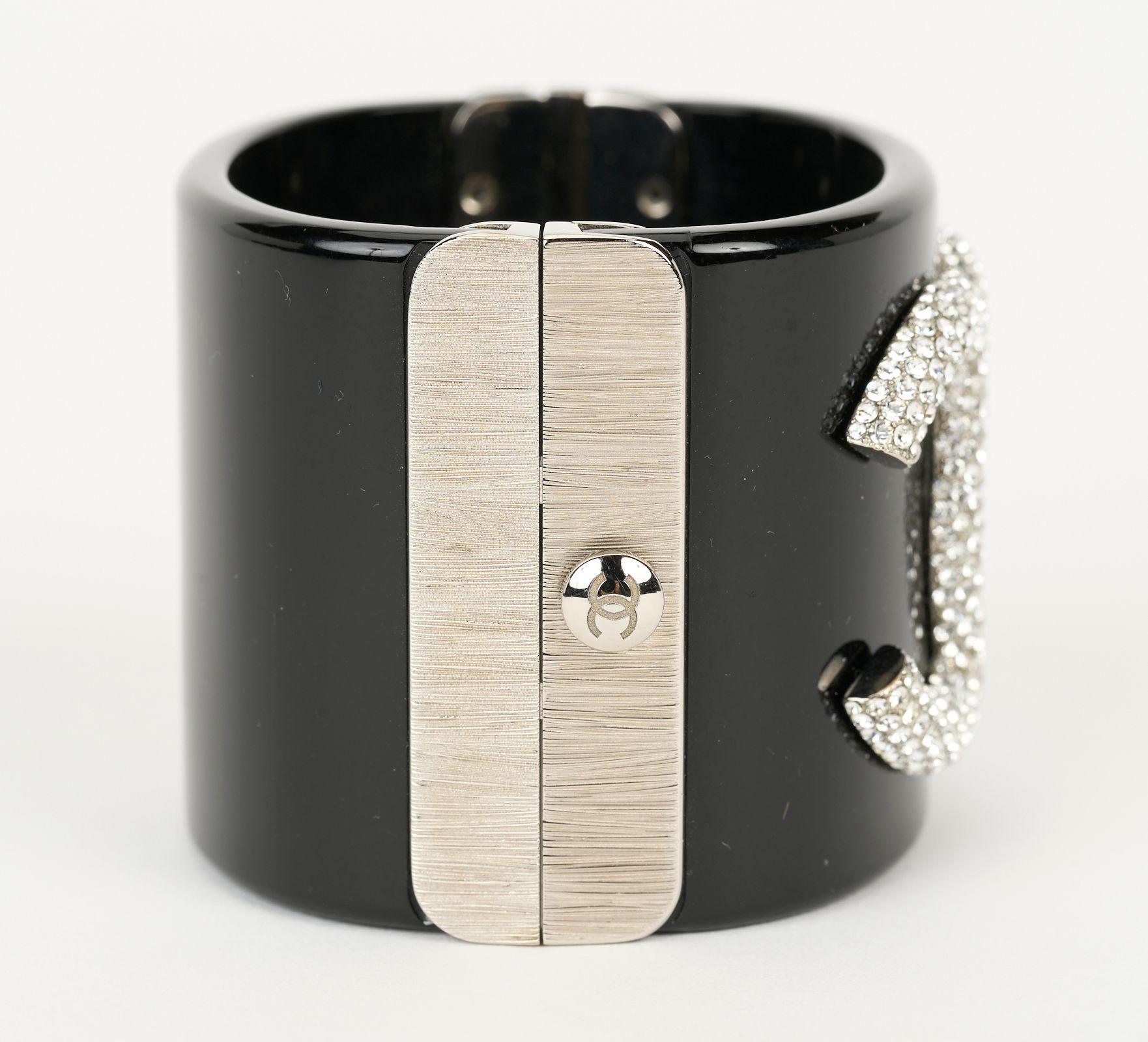 This Chanel CC Crystal Cuff Bracelet in black with crystal CC on front takes you from day to evening. Circumference 6.5