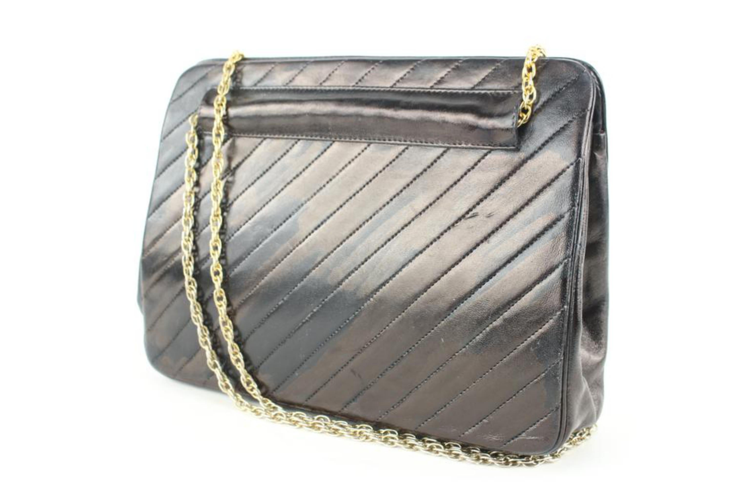 Chanel Black Chevron Leather Chain Bag 113ca57
Made In: France
Measurements: Length:  9.5