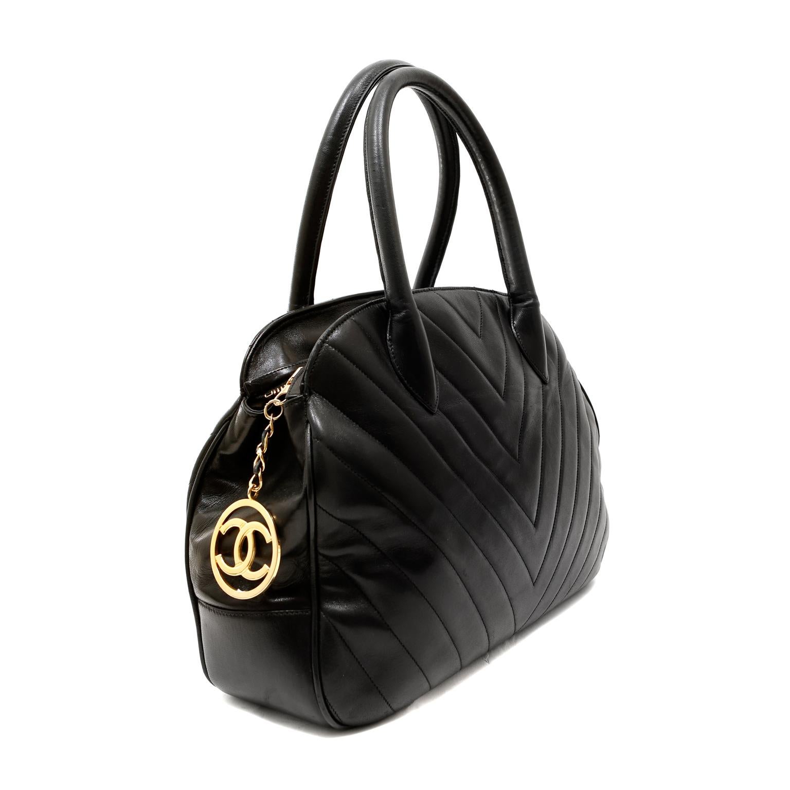 This authentic Chanel Black Chevron Leather Day Bag is in very good vintage condition, circa 1989-1991.  Timeless and sophisticated, this classic Chanel is the perfect way to elevate any everyday ensemble.  
Soft black leather is quilted in chevron