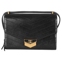 Chanel Black Chevron Quilted Calfskin Medal Flap Bag