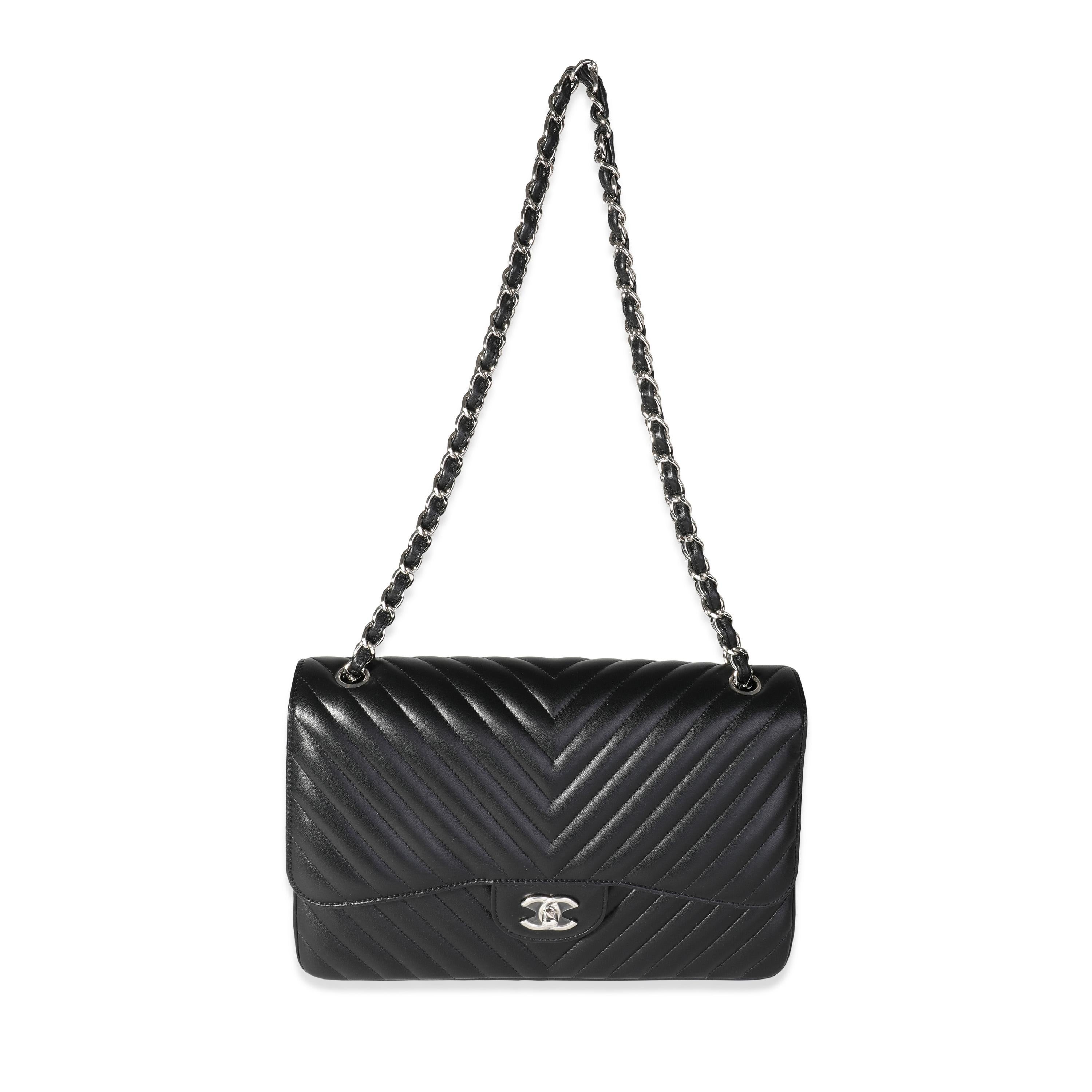 Listing Title: Chanel Black Chevron Quilted Classic Jumbo Double Flap
SKU: 118785
MSRP: 9500.00
Condition: Pre-owned (3000)
Handbag Condition: Never Worn
Brand: Chanel
Origin Country: Italy
Handbag Silhouette: Shoulder Bag
Occasions: