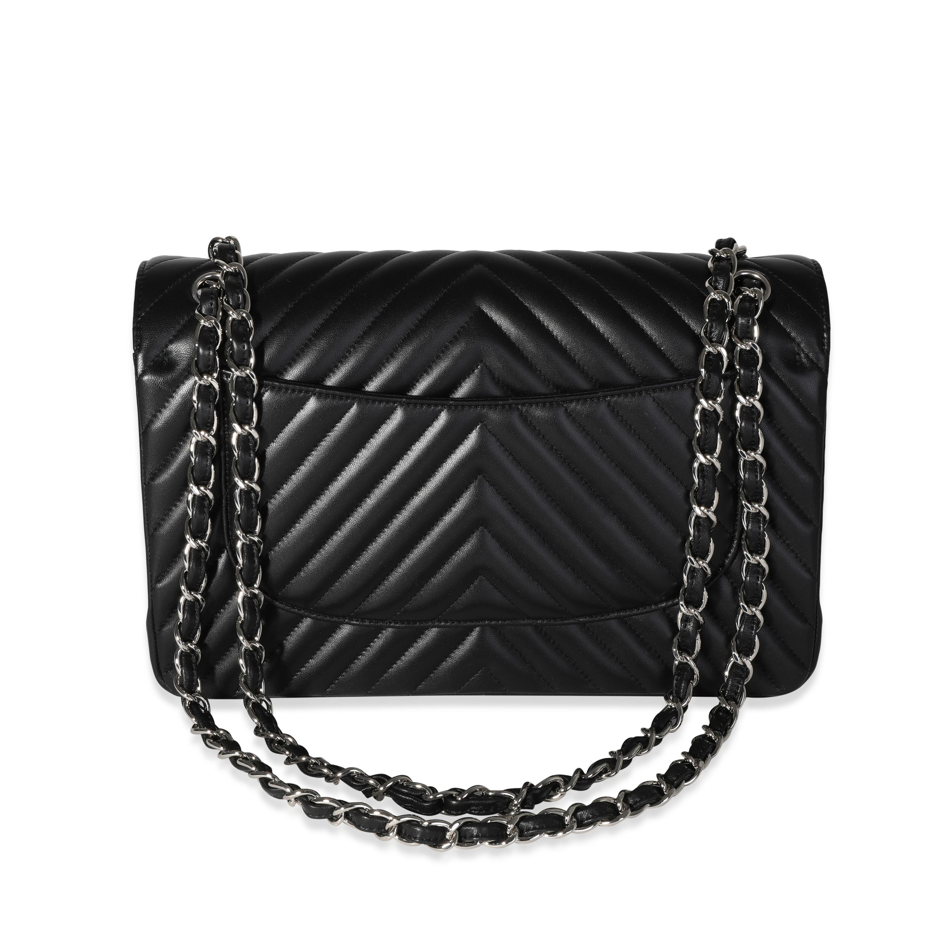 Chanel Black Chevron Quilted Classic Jumbo Double Flap In Excellent Condition In New York, NY