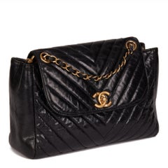 CHANEL Black Chevron Quilted Crumpled Calfskin Leather Classic Single Flap Bag