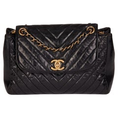 CHANEL Black Chevron Quilted Crumpled Calfskin Leather Classic Single Flap Bag