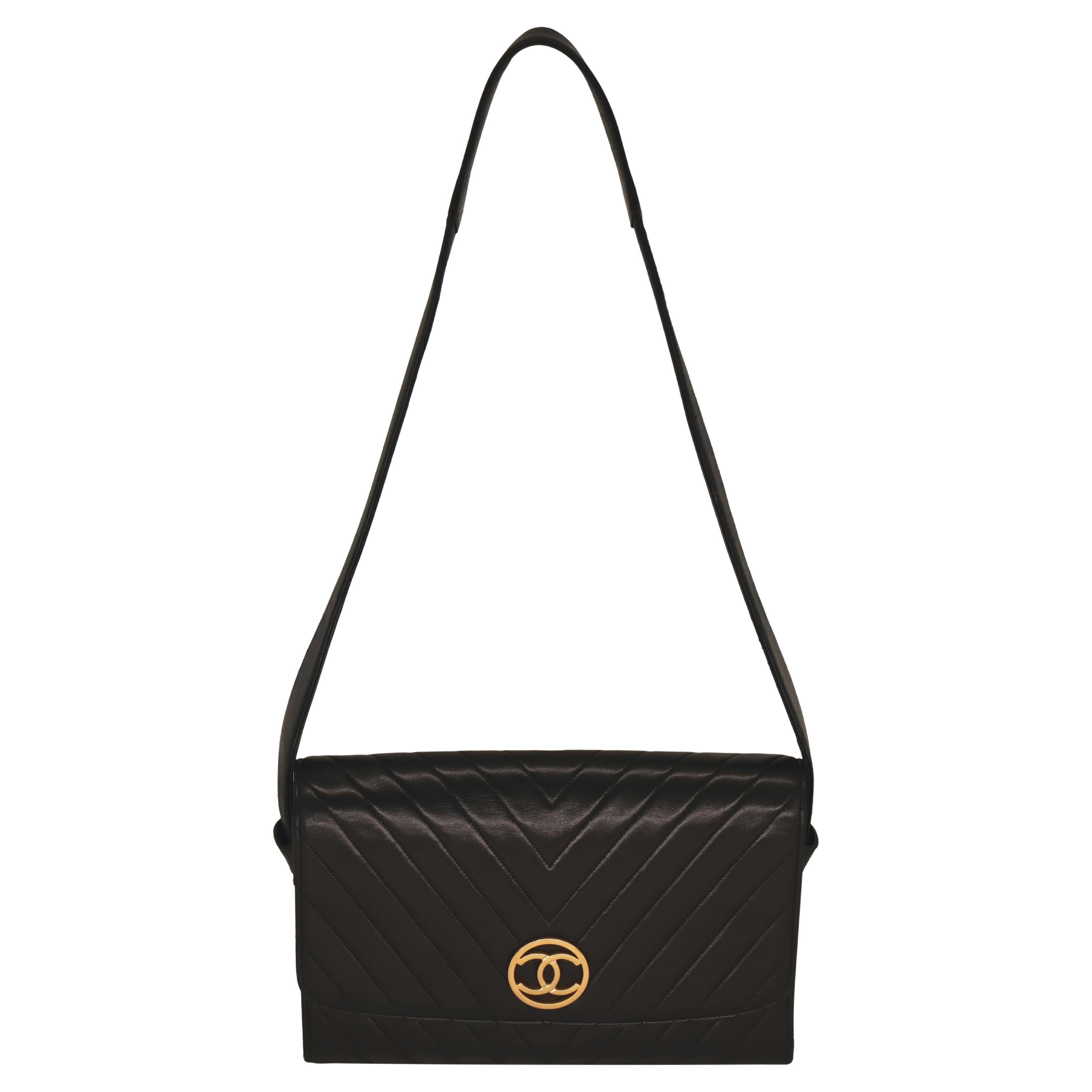 Chanel Black Chevron Quilted Lambskin Leather Single Flap Shoulder Bag with 24KT Hardware, 1994 - 1996. The iconic Chanel bag was originally issued by Coco Chanel in February 1955 which became the very first socially acceptable shoulder bag for the