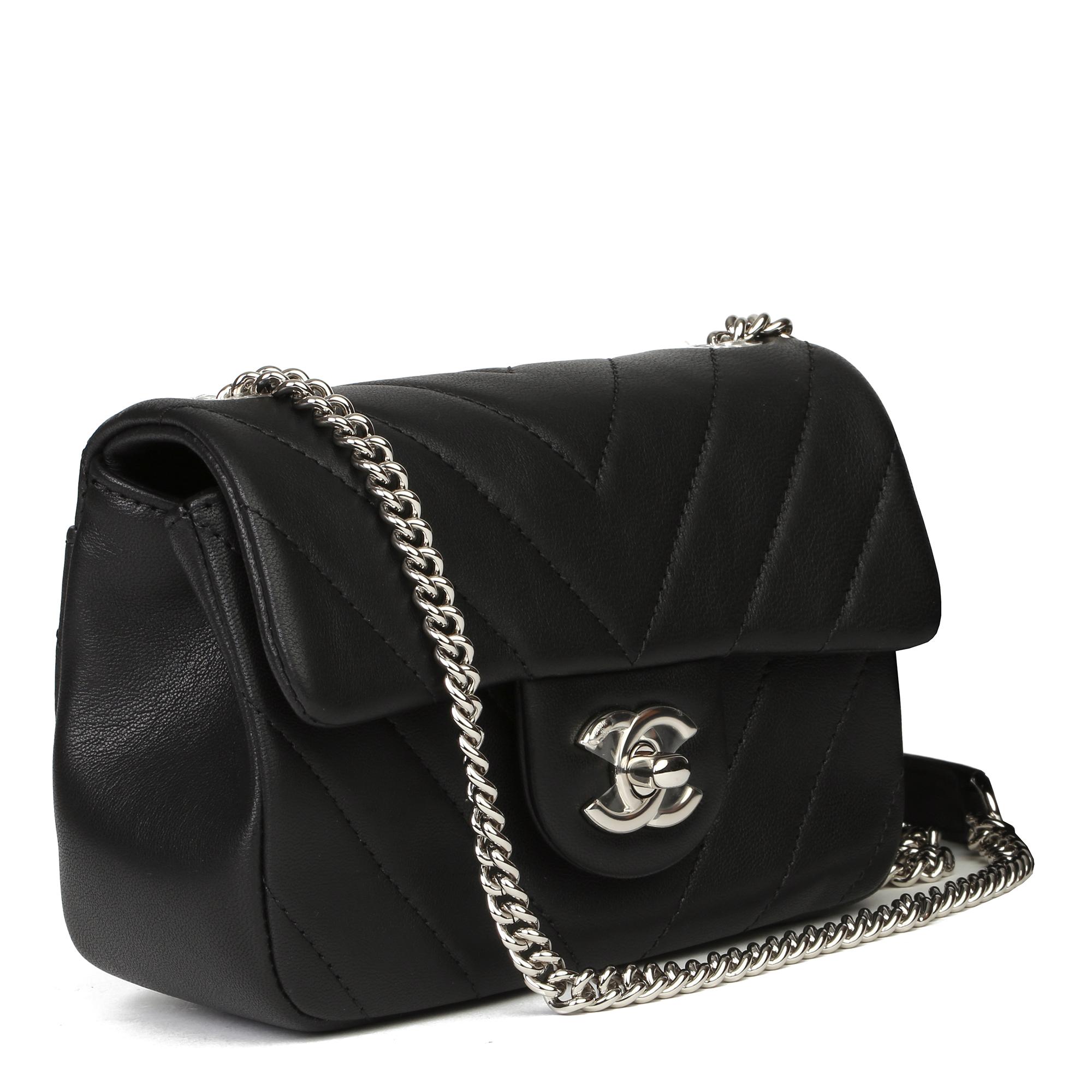 CHANEL
Black Chevron Quilted Lambskin Mini Flap Bag

Xupes Reference: HB3926
Serial Number: 24828526
Age (Circa): 2018
Accompanied By: Chanel Dust Bag, Authenticity Card
Authenticity Details: Authenticity Card, Serial Sticker (Made in Italy)