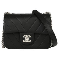 Chanel Black Chevron Quilted Lambskin Mini Flap Bag