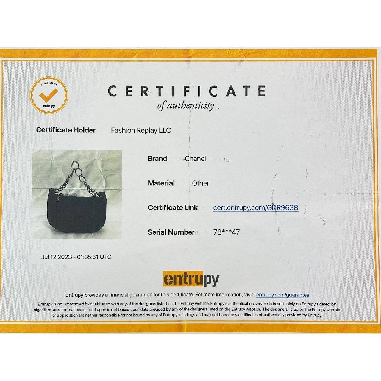 Pre-Owned  100% Authentic
Chanel Black Chocolate Bar Nylon Pochette Bag
RATING: A/B...Very Good, well maintained, 
shows minor signs of wear
MATERIAL: nylon , leather trim
HANDLE:  single chain