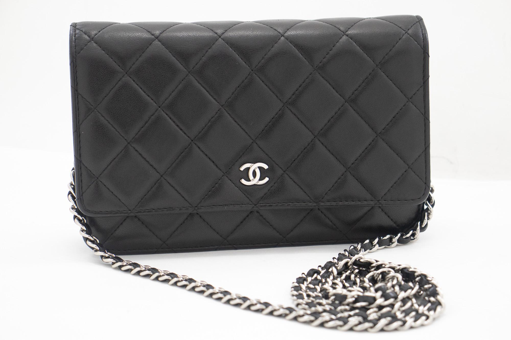 An authentic CHANEL Black Classic Wallet On Chain WOC Shoulder Bag made of black Lambskin. The color is Black. The outside material is Leather. The pattern is Solid. This item is Contemporary. The year of manufacture would be 2015.
Conditions &