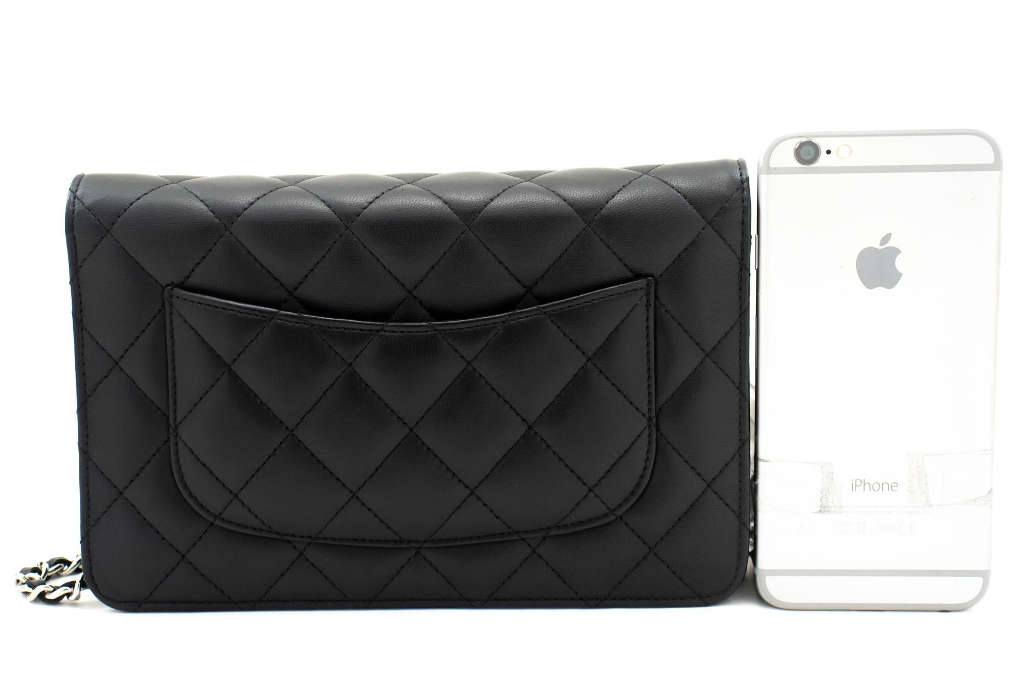 An authentic CHANEL Black Classic Wallet On Chain WOC Shoulder Bag made of black Lambskin. The color is Black. The outside material is Leather. The pattern is Solid. This item is Contemporary. The year of manufacture would be 2013.
Conditions &