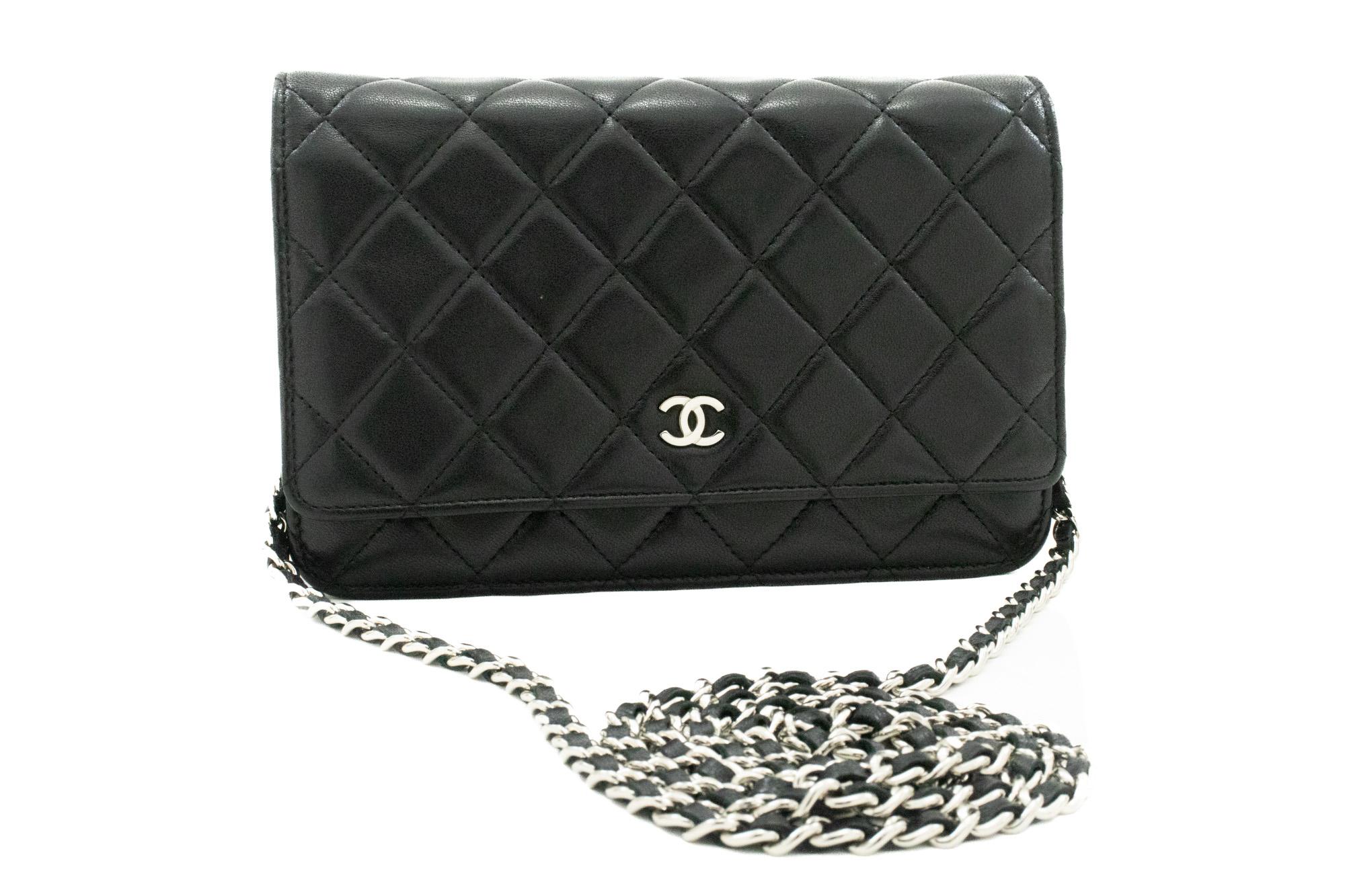 An authentic CHANEL Black Classic Wallet On Chain WOC Shoulder Bag made of black Lambskin Silver. The color is Black. The outside material is Leather. The pattern is Solid. This item is Contemporary. The year of manufacture would be 2014.
Conditions