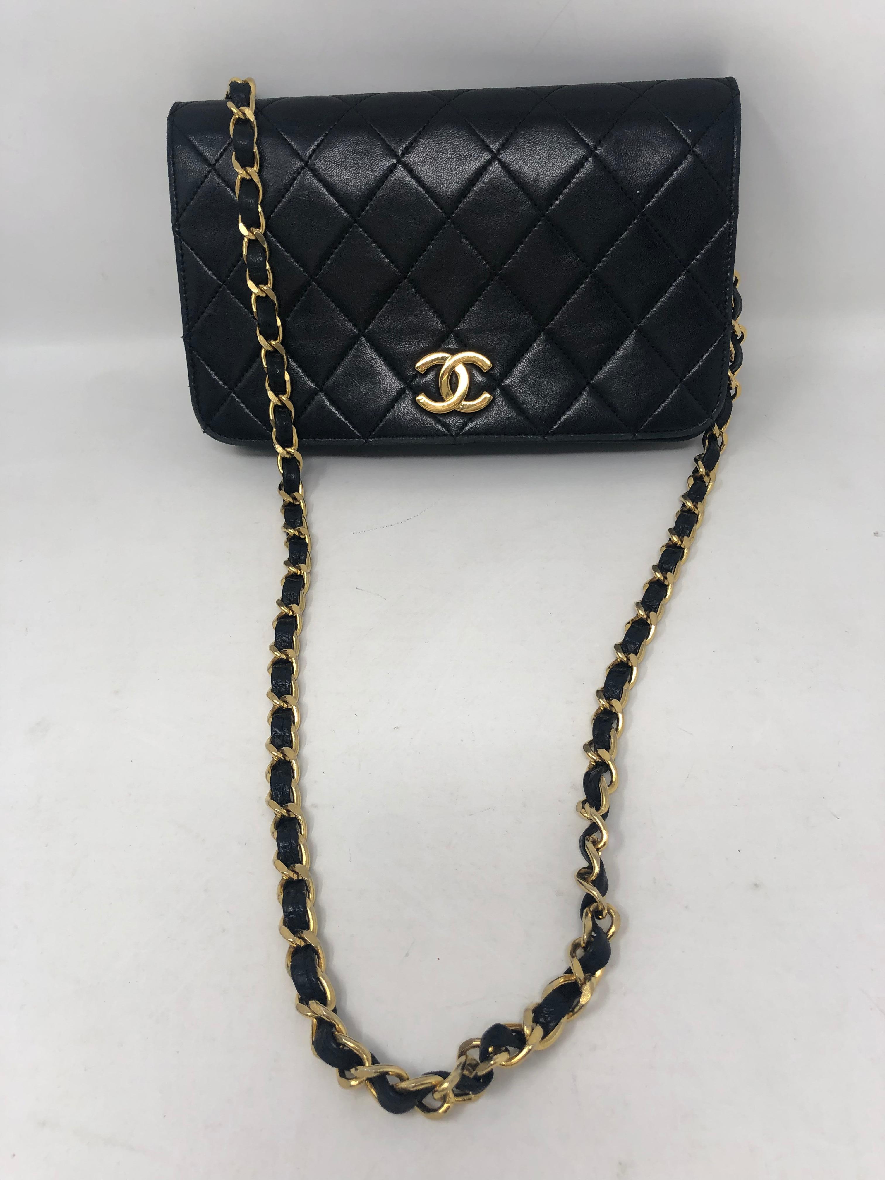 Chanel Black Clutch/ Evening Bag. Chain can be tucked in and worn as a clutch. Also can be worn as a shoulder bag. Beautiful black lambskin leather. Vintage piece. Good condition. Classic style. Guaranteed authentic. 