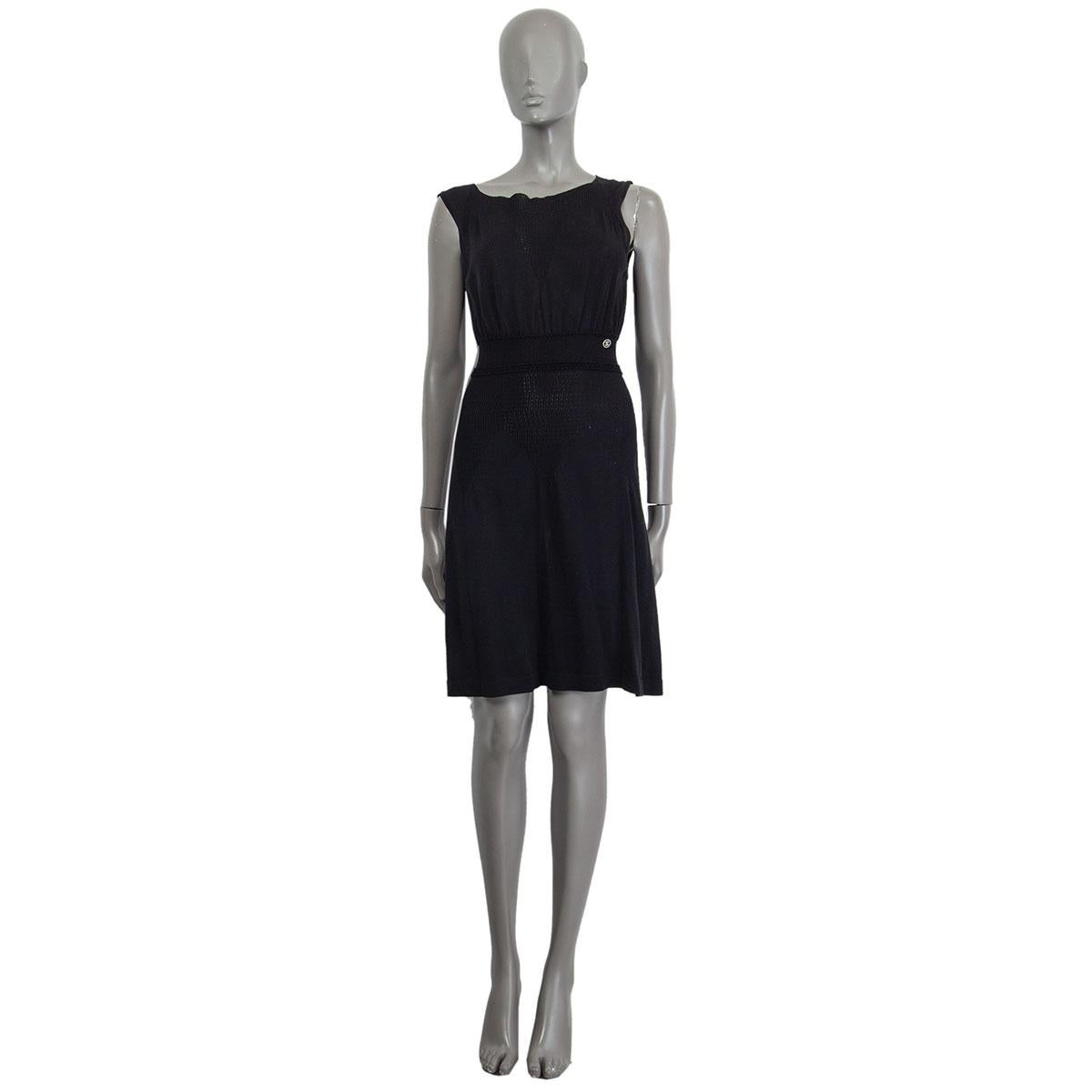 100% authentic Chanel sleeveless knit dress in black cotton (100%) with a wide neckline. Unlined. Has been worn and is in excellent condition.  

2011 Spring/Summer

Measurements
Tag Size	36
Size	XS
Shoulder Width	40cm (15.6in)
Bust	74cm (28.9in) to