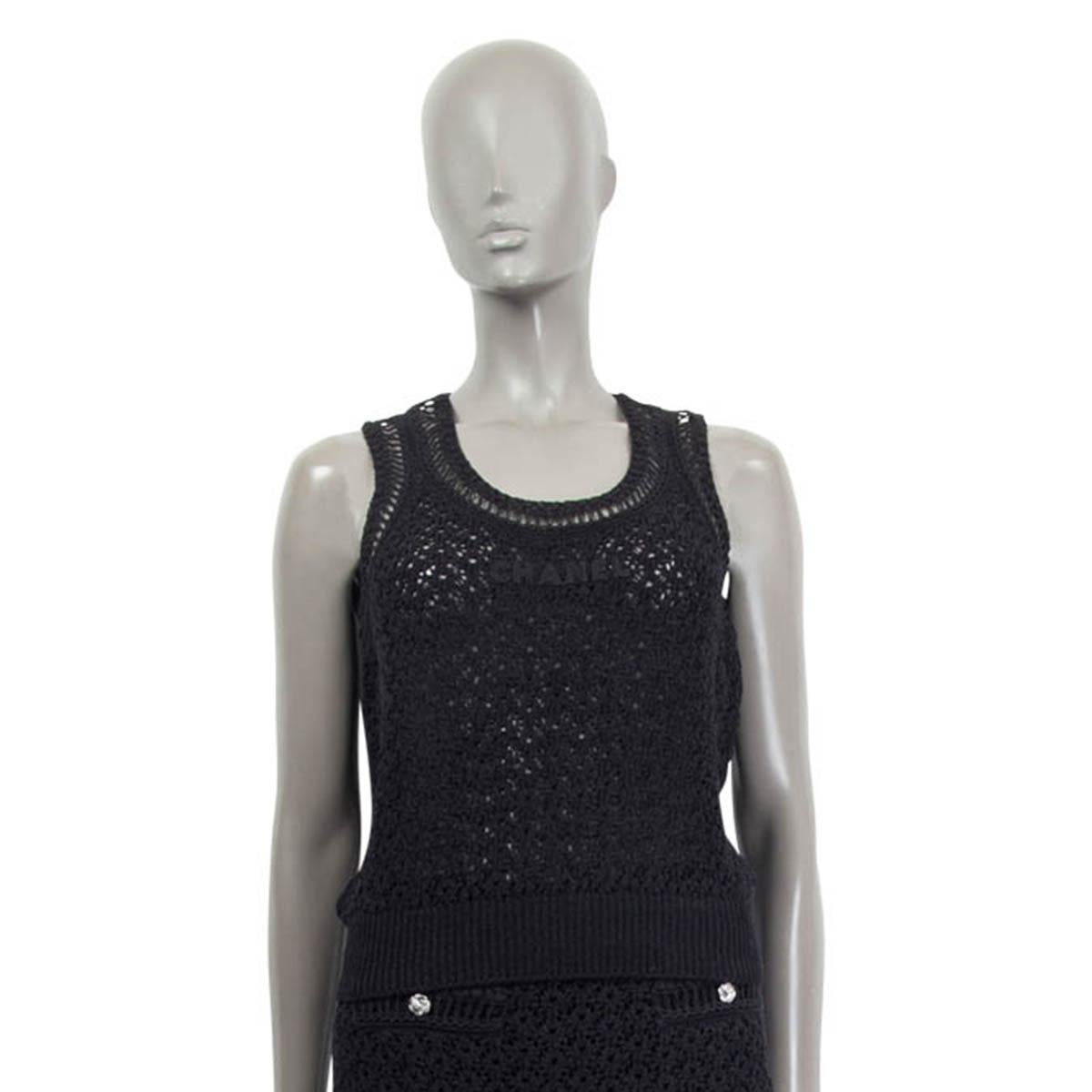 100% authentic Chanel sleeveless top in black cotton (65%) and polyamide (35%). Pre spring/summer 2020 collection. Embellished with an embroidered Chanel logo in black on the front.  Has been worn and is in excellent condition. Matching cardigan and