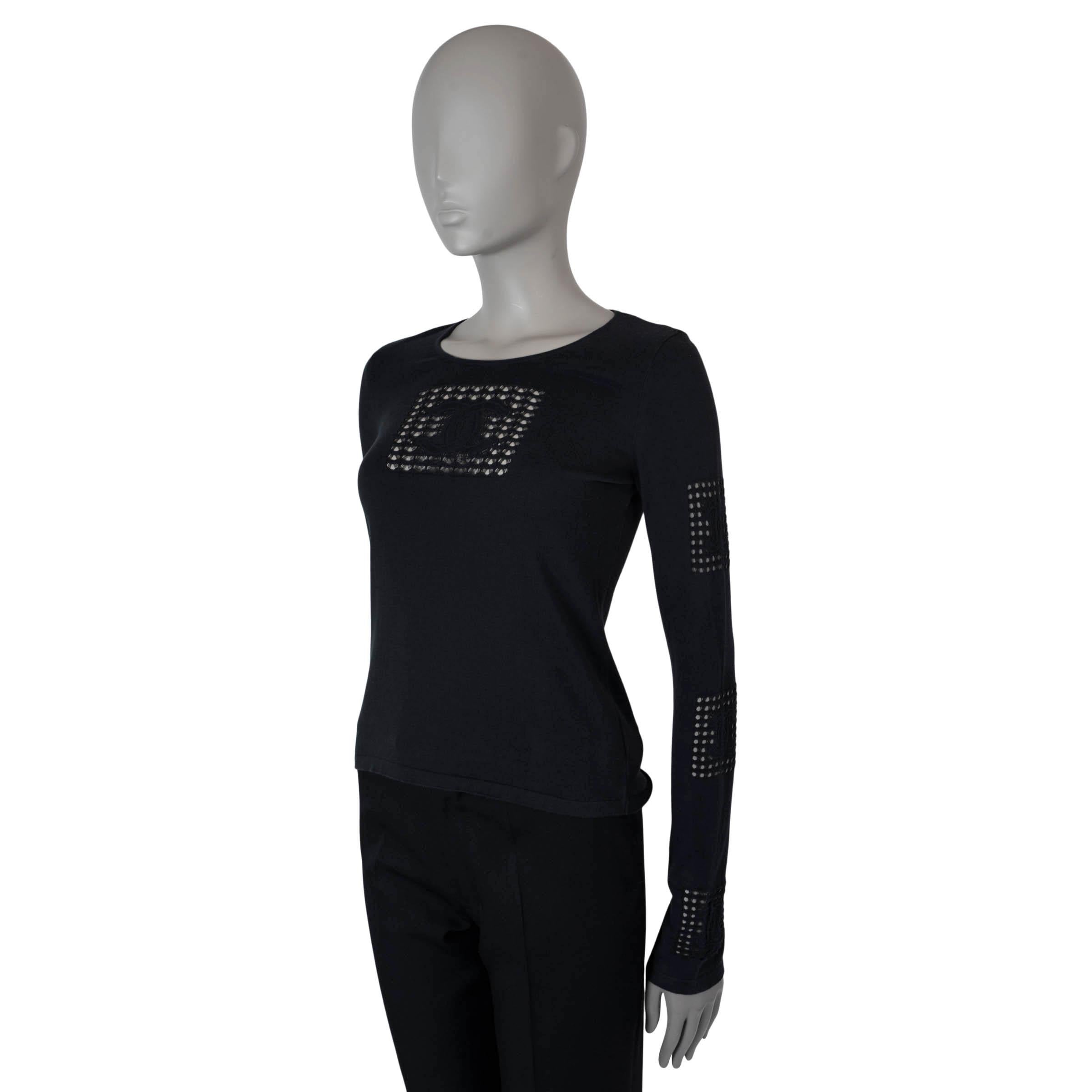This 100% authentic Chanel vintage long sleeve sweater is crafted from pure cotton (100%) for a soft and breathable feel. It features a timeless round neck design and showcases signature square CC logo lace inserts on the front and sleeves, adding a