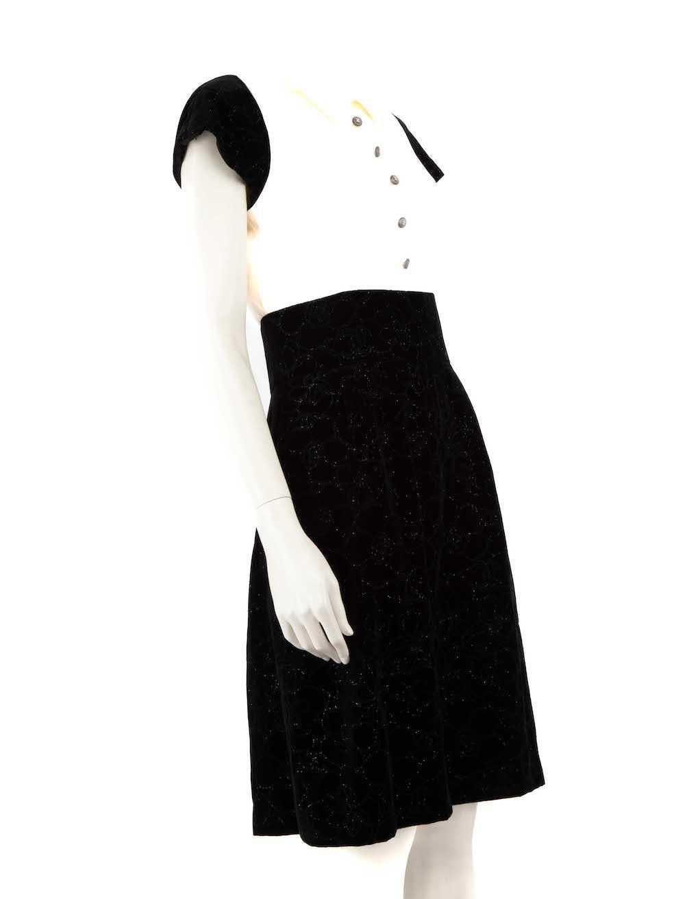 CONDITION is Very good. Minimal wear to dress is evident. Minimal wear to the sides with small discolouration and the back with some pulls to the weave. The brand label has a hole on this used Chanel designer resale item.
 
 
 
 Details
 
 
 Black