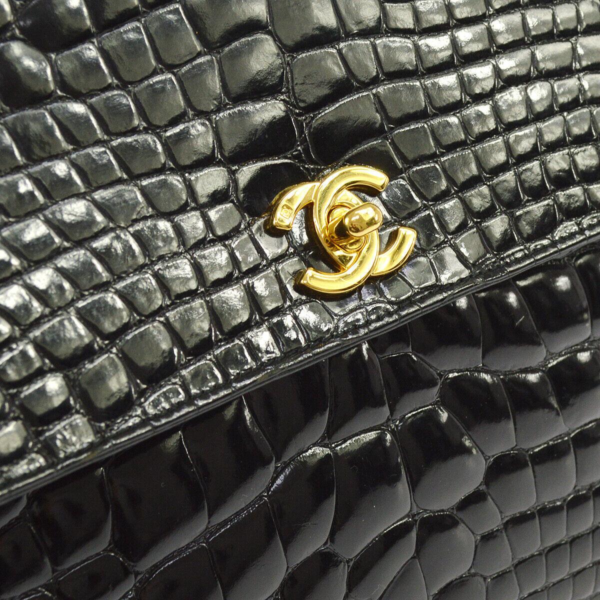 Chanel Black Crocodile Exotic Leather Gold Evening Kelly Top Handle Tote Flap Satchel Bag

Crocodile
Leather
Gold tone hardware
Leather lining
Made in France
Date code present 
Handle drop 3.5