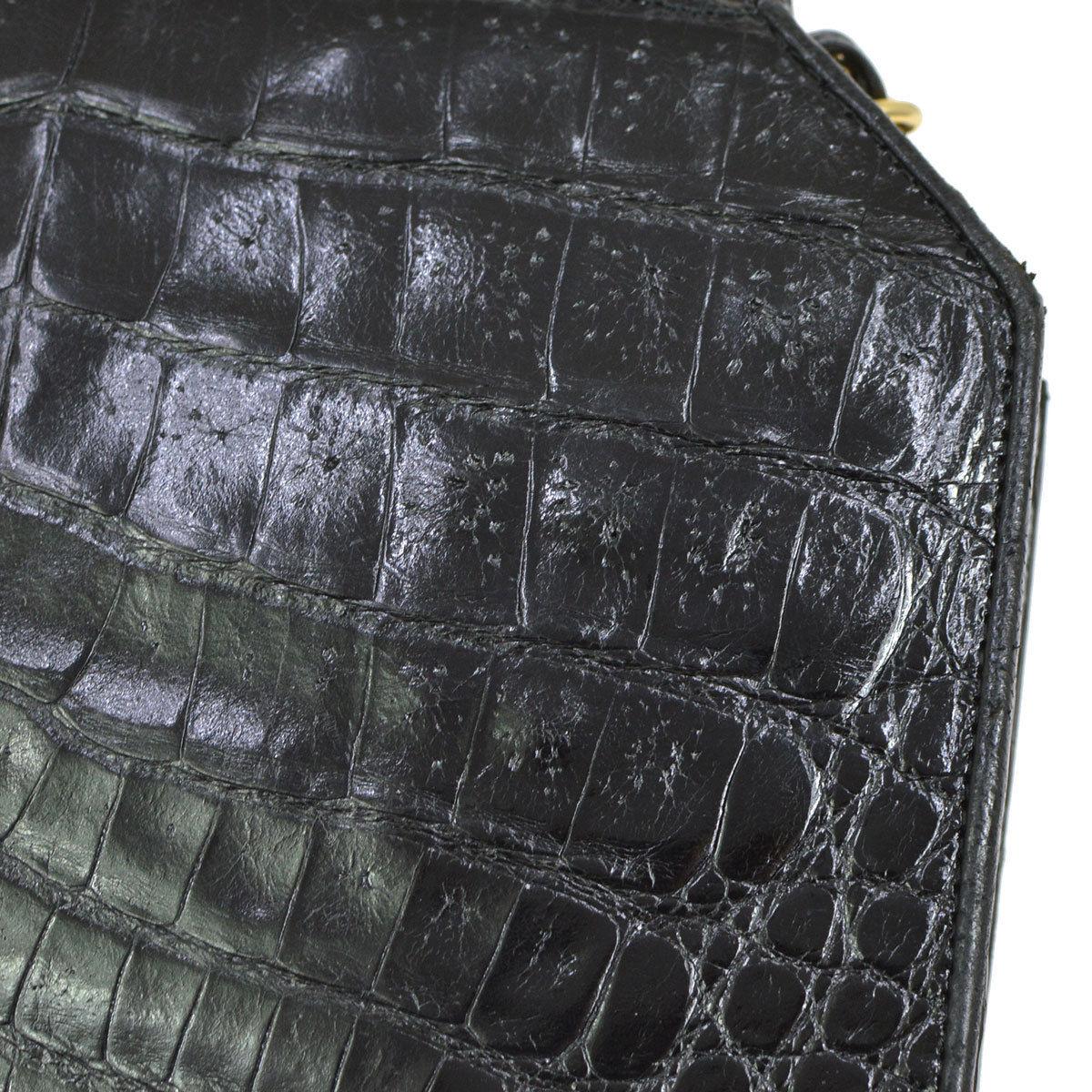 Chanel Black Crocodile Exotic Leather Gold Small Mini Evening Shoulder Flap Bag

Crocodile
Leather
Gold tone hardware
Leather lining 
Shoulder strap 17