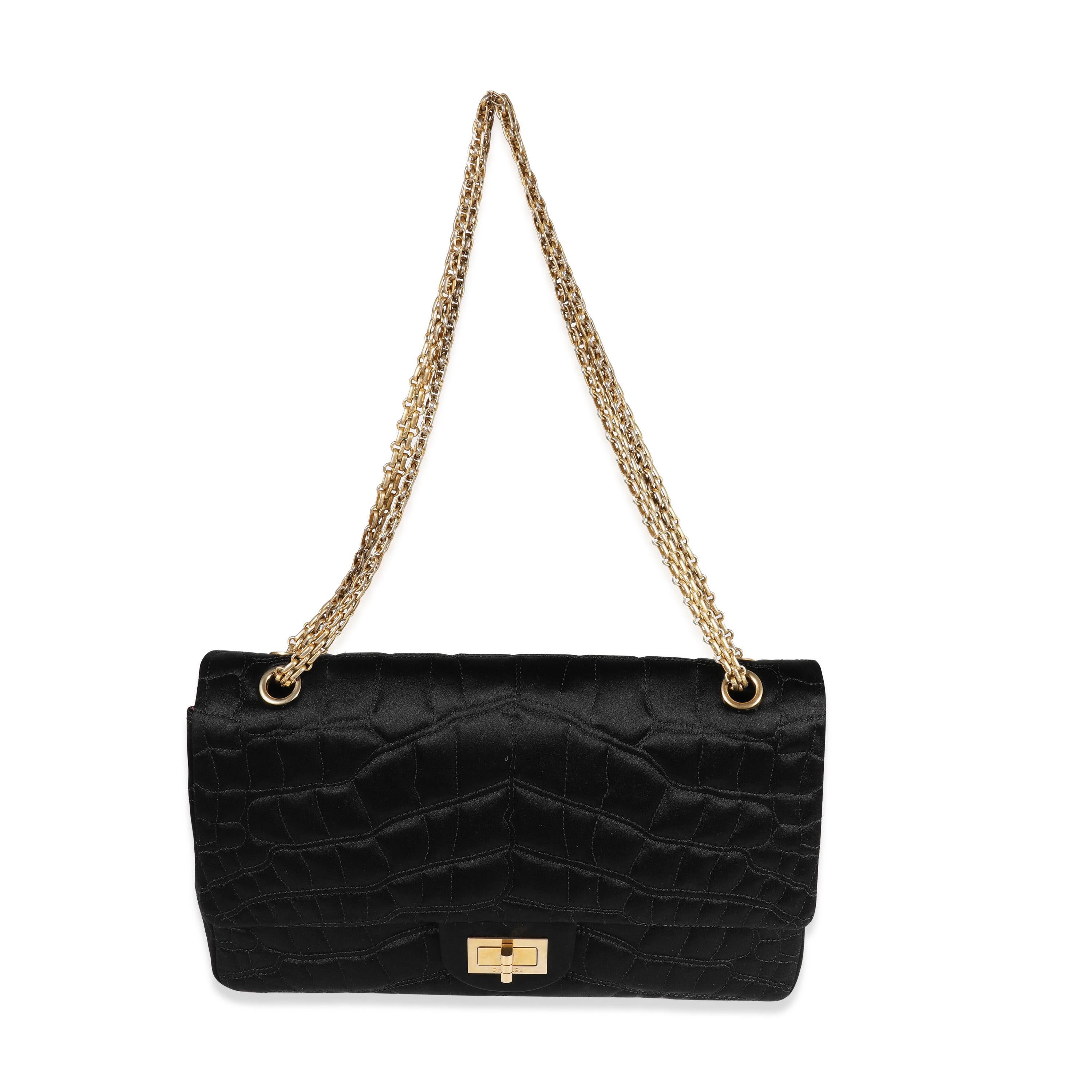 Listing Title: Chanel Black Crocodile Stitch Satin Reissue 2.55 227 Double Flap Bag
SKU: 122322
Condition: Pre-owned 
Handbag Condition: Very Good
Condition Comments: Very Good Condition. Light snags to exterior. Scratching and tarnishing to