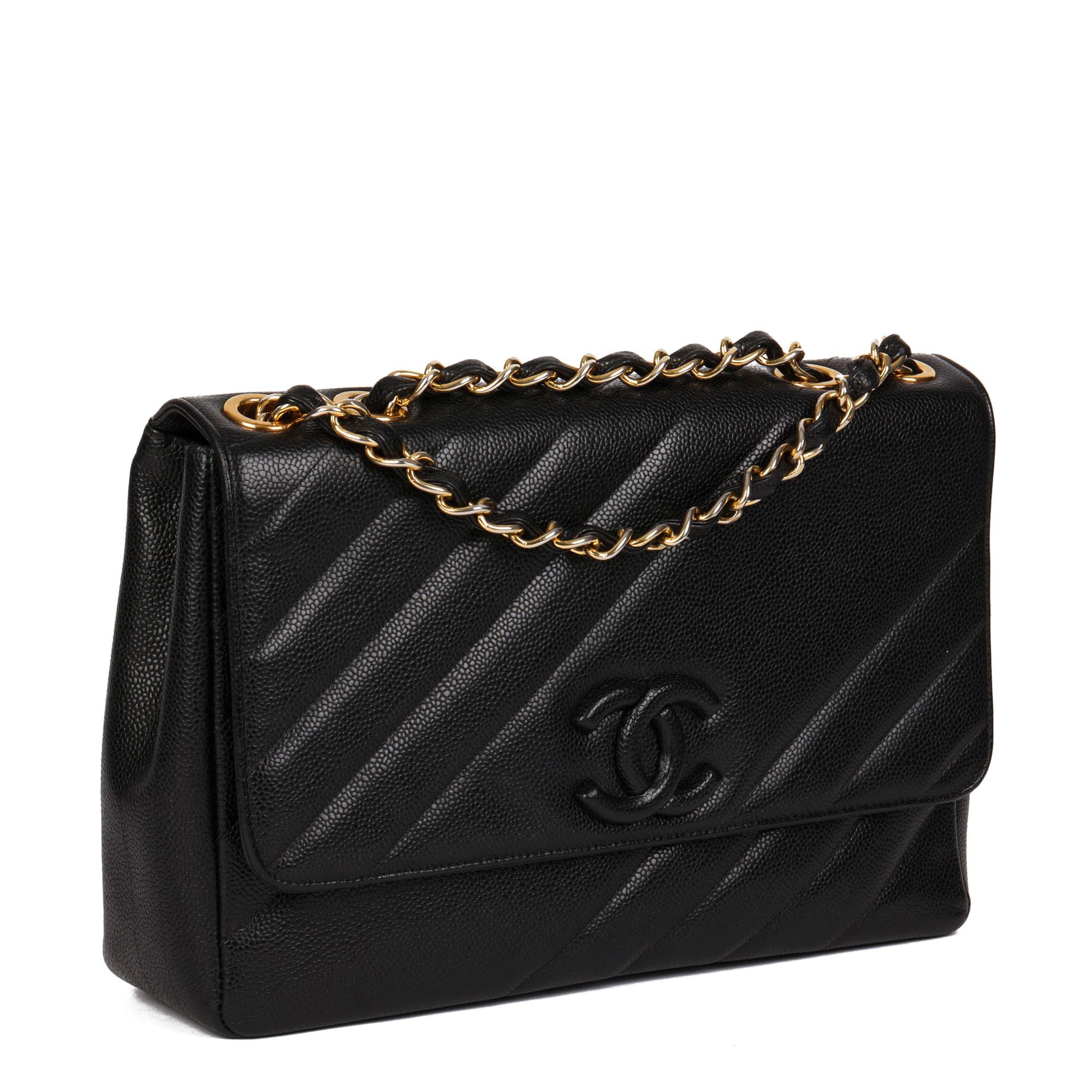 CHANEL
Black Diagonal Quilted Caviar Leather Vintage Jumbo Leather Logo Classic Single Flap Bag

Xupes Reference: HB4378
Serial Number: 3348247
Age (Circa): 1994
Accompanied By: Chanel Dust Bag, Authenticity Card, Care Booklet
Authenticity Details:
