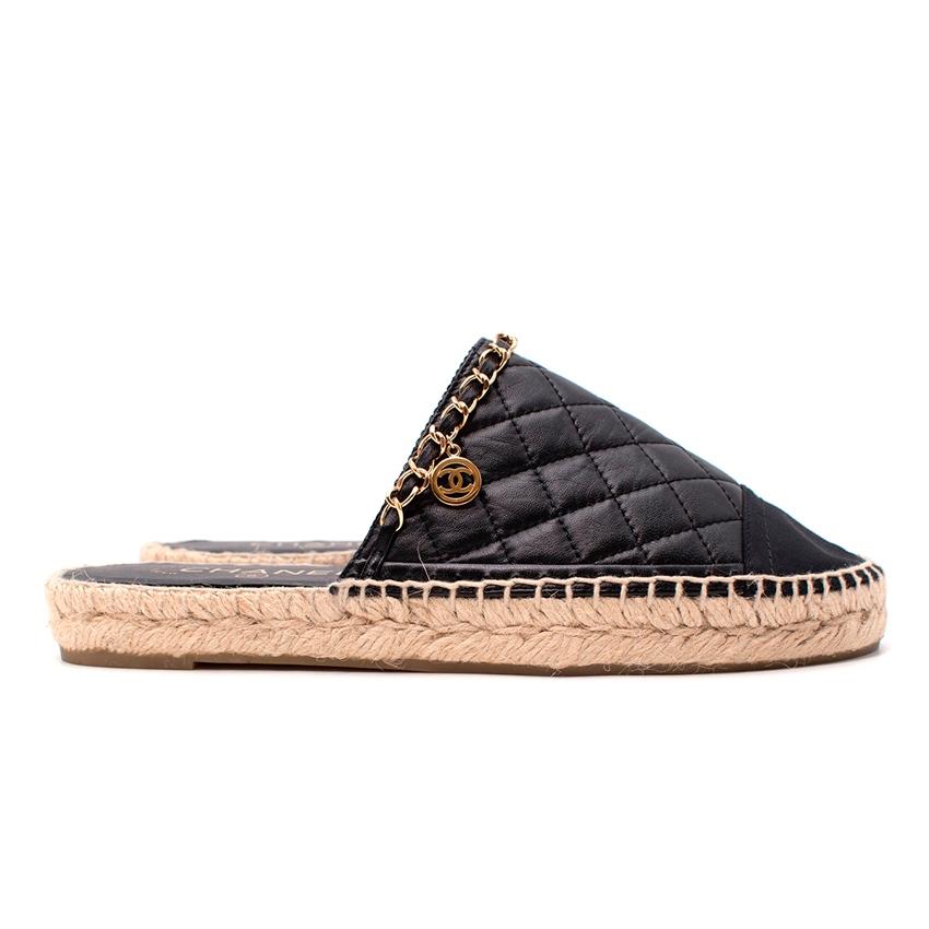  Chanel Black Diamond-Quilted Lambskin Suede Toe Cap Espadrilles
 

 - Black diamond-quilted lambskin upper, with a contrasting black suede toe cap
 - Upper trimmed with a signature gold-tone chain and hanging CC logo pendant
 - Braided jute midsole