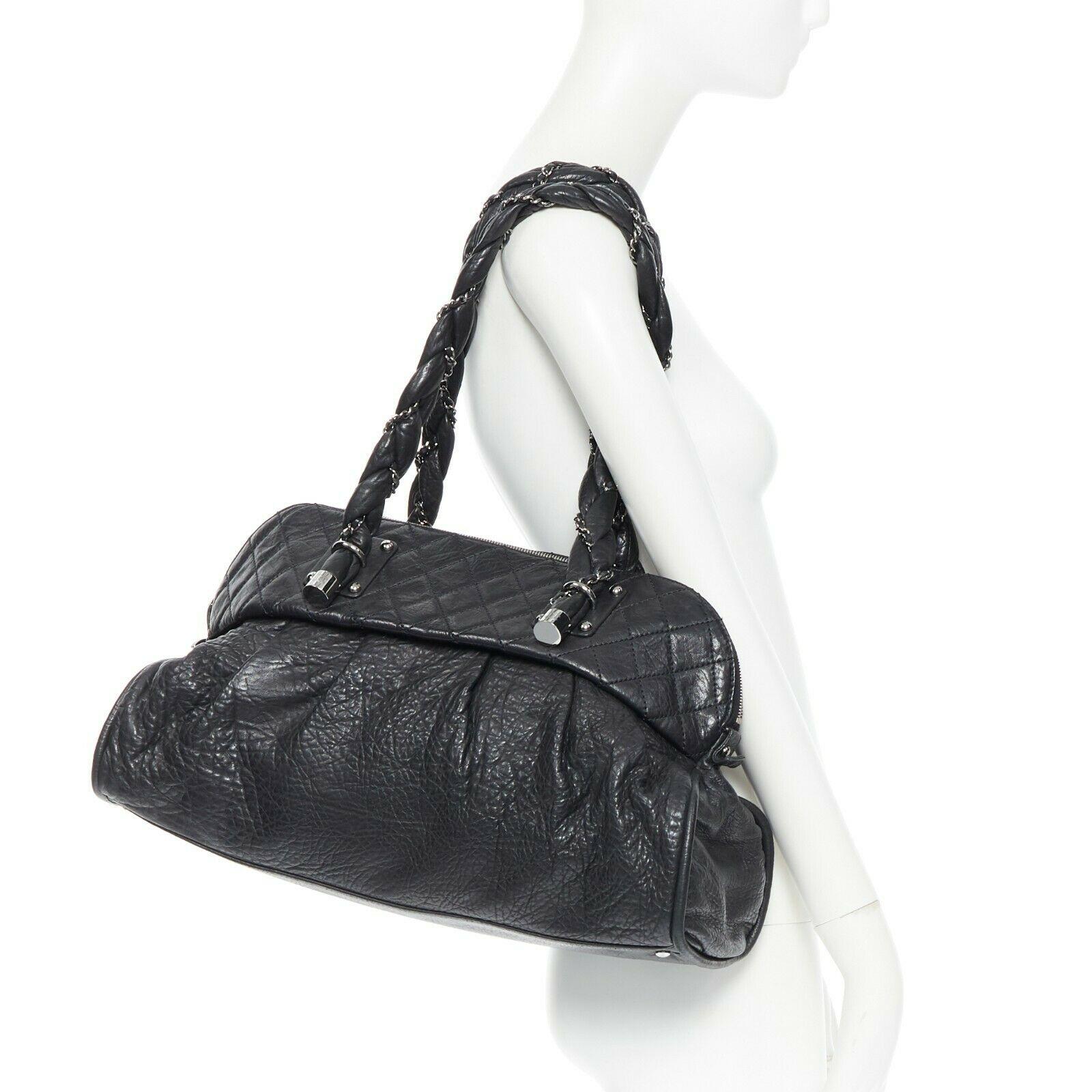CHANEL black diamond quilted pebbled leather 2.55 braid strap shoulder bag
Brand: CHANEL
Designer: Karl Lagerfeld
Model Name / Style: Dumpling bag
Material: Leather
Color: Black
Pattern: Solid
Closure: Zip
Lining material: Leather
Extra Detail: