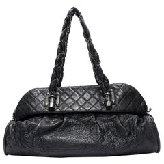 CHANEL black diamond quilted pebbled leather 2.55 braid strap shoulder bag