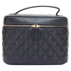 CHANEL black diamond quilted pebbled leather large top handle vanity case bag