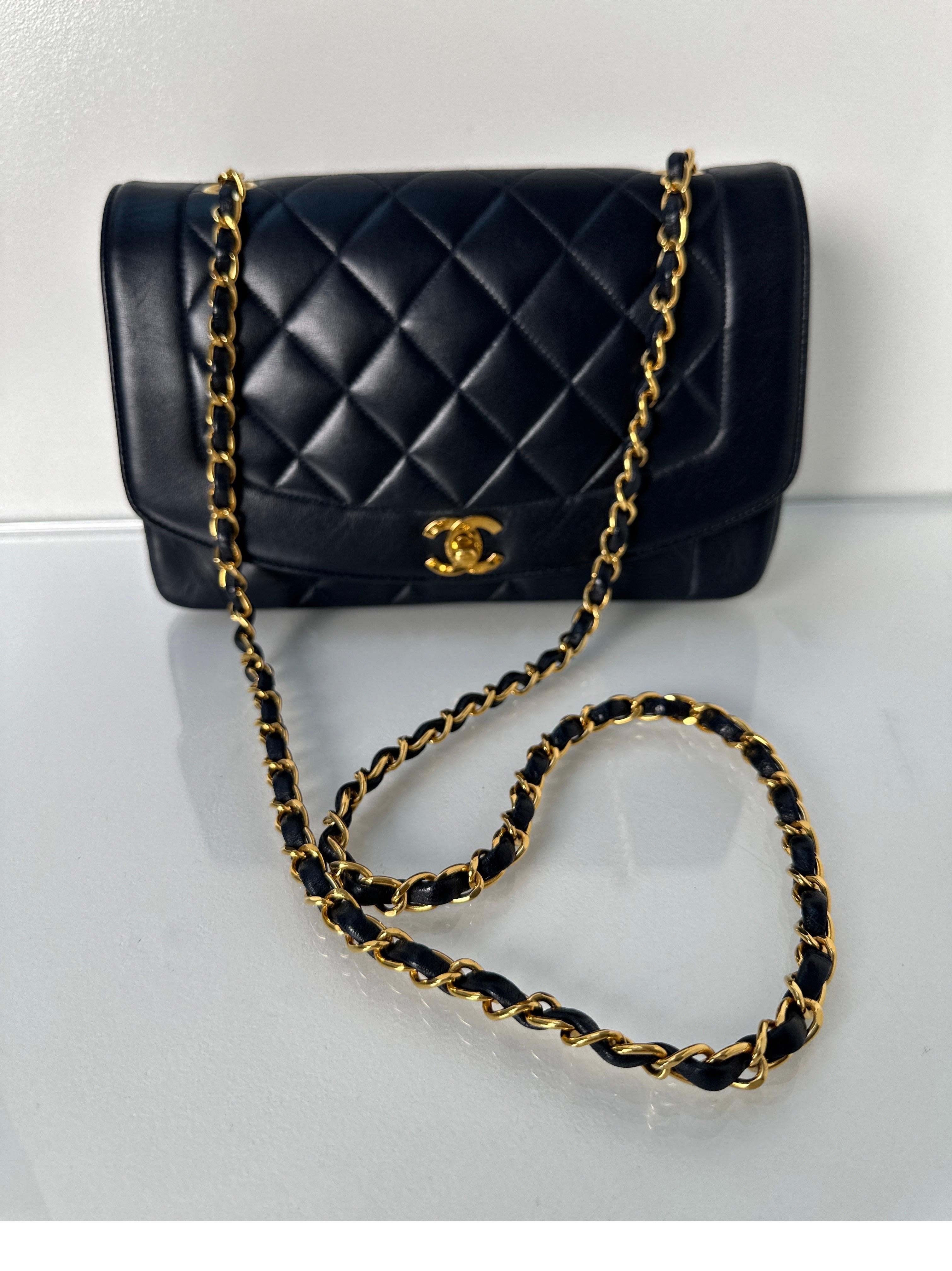 Chanel Diana Black Bag. Vintage Chanel with gold hardware. Highly collected Diana bag with lambskin leather. Gold hardware. 24 kt gold hardware. Interior clean. Excellent condition. 