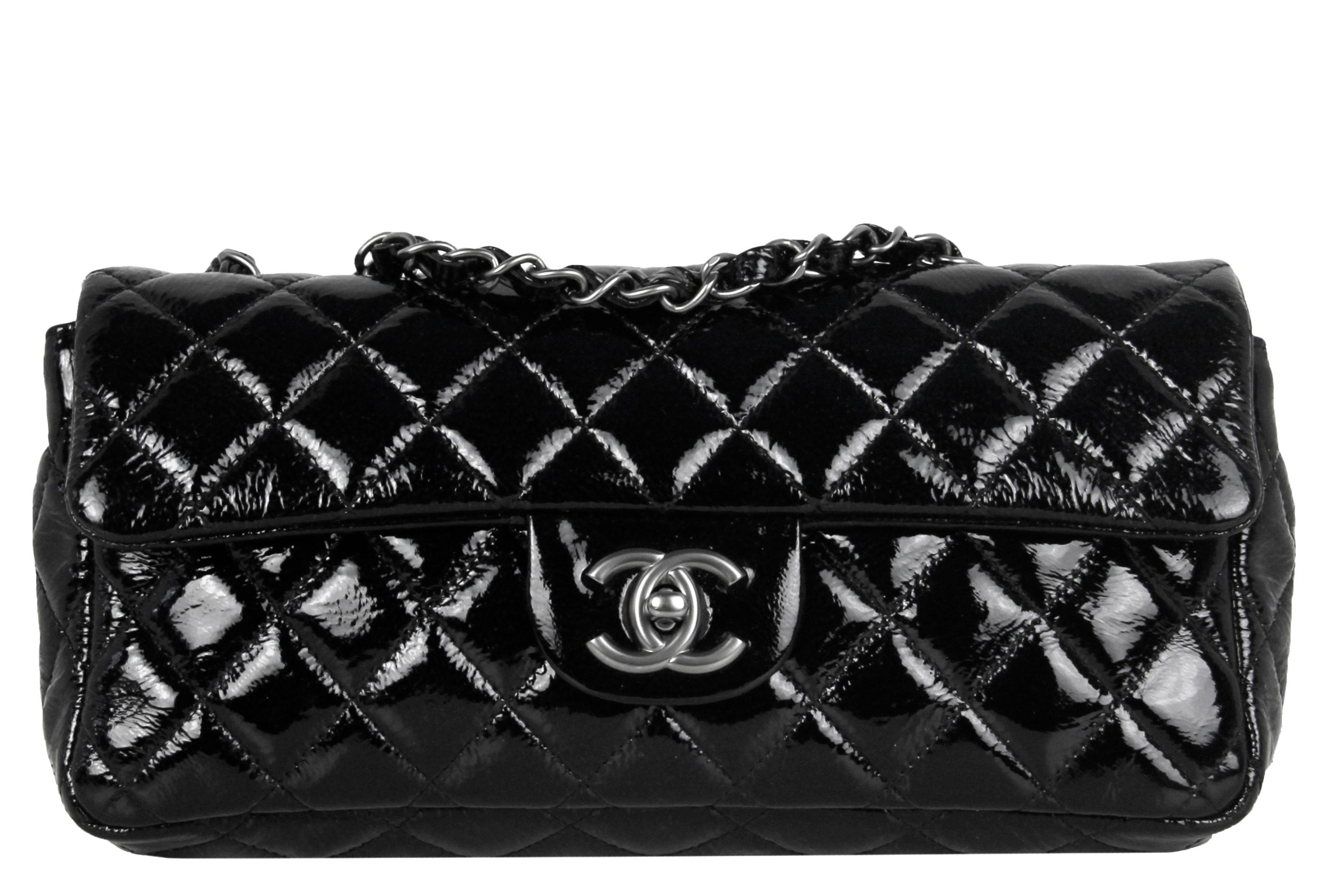 Chanel Black Distressed Patent Quilted East West Flap Bag

Made In: Italy
Year of Production: 2008-2009
Color: Black
Hardware: Darkened silvertone
Materials: Distressed patent leather
Lining: Smooth burgundy leather 
Closure/Opening: Flap top with