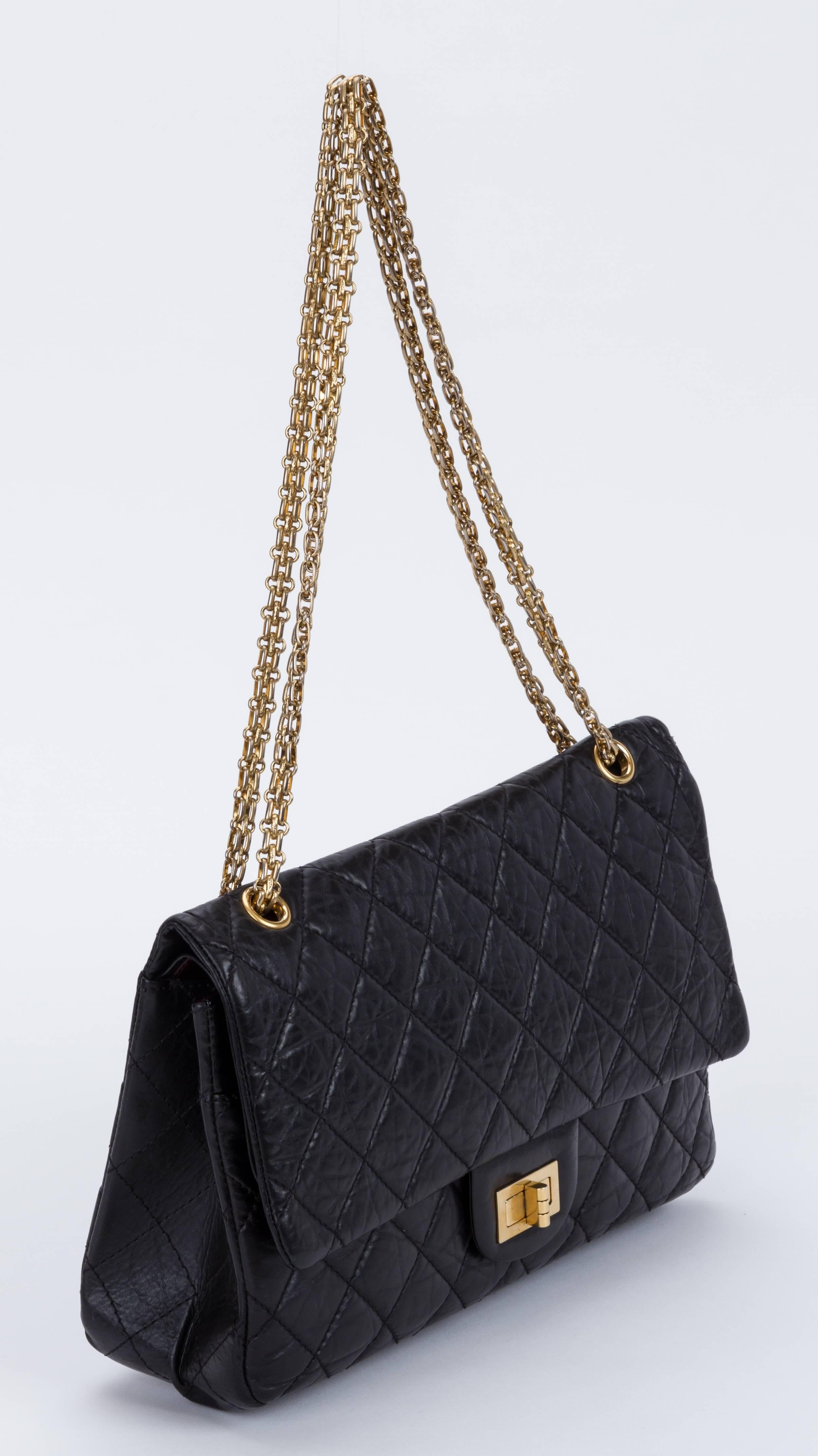 Chanel black distressed metallic reissue jumbo classic flap bag. Gold tone hardware. Shoulder drop, 9.5