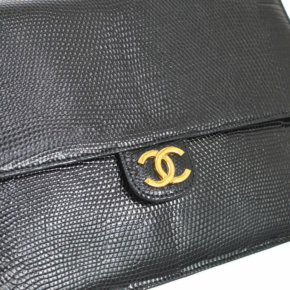 Chanel Black Exotic Lizard Leather Gold Evening Small Shoulder Flap Bag

Lizard
Leather
Leather lining
Gold tone hardware
Measures 9.5