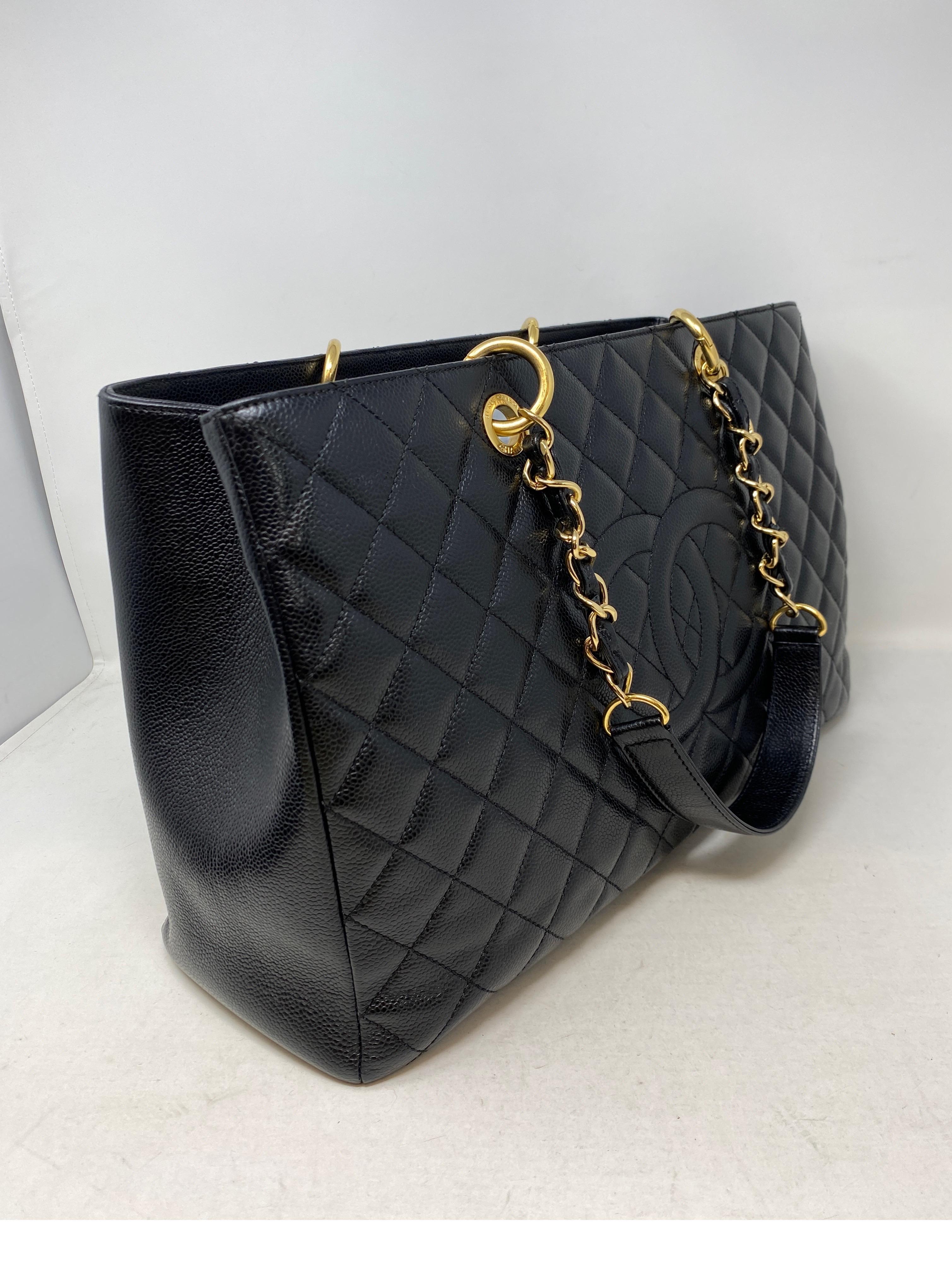 Chanel Black Extra Large Grand Shopper Tote Bag. Caviar black leather. Excellent condition. Gold hardware. Looks like it was nevr used. Retired style from Chanel. A great one to add to your collection. Interior clean. Guaranteed authentic. 
