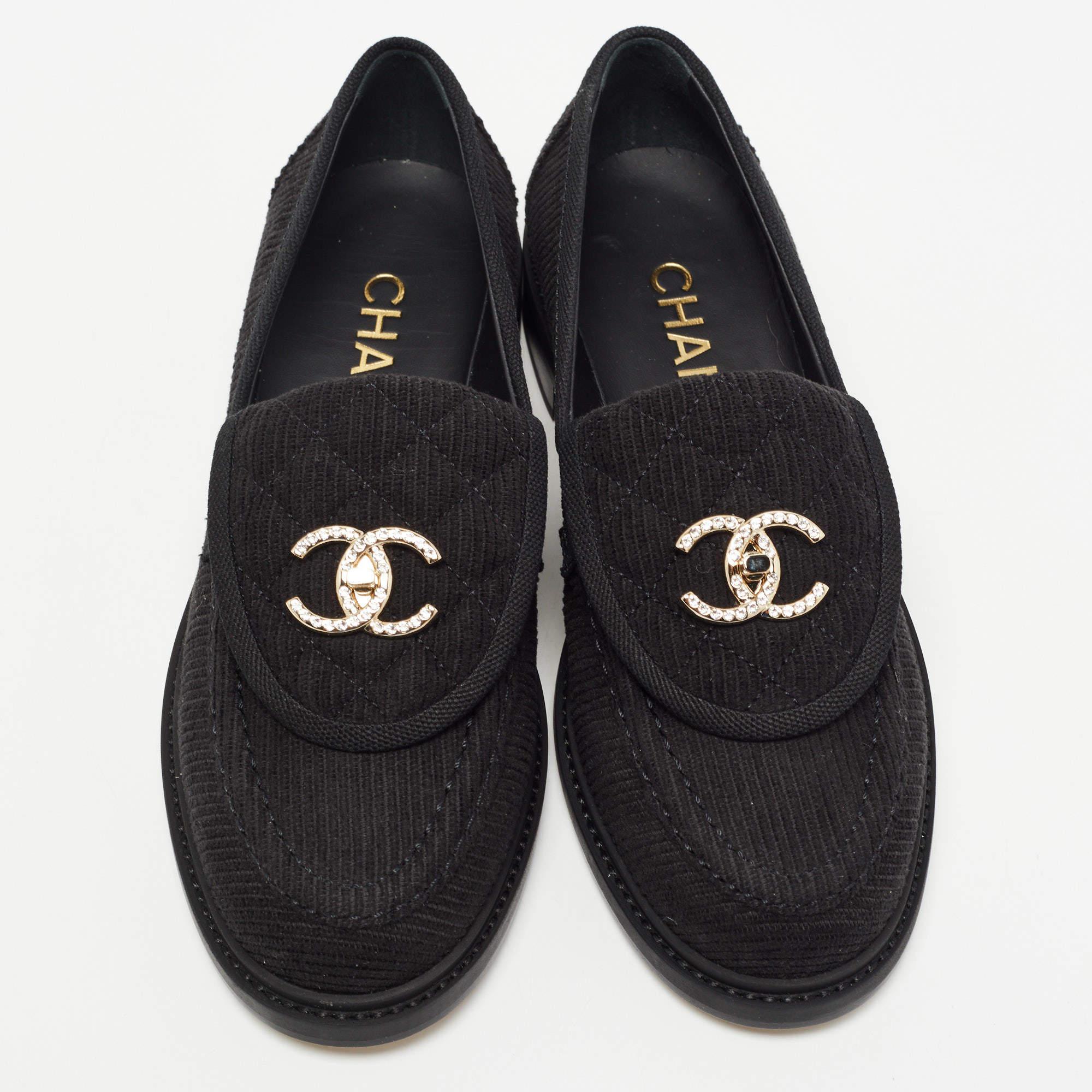 Let this comfortable pair be your first choice when you're out for a long day. These Chanel black shoes have well-sewn uppers beautifully set on durable soles.

Includes: Original Dustbag, Original Box, Info Booklet

