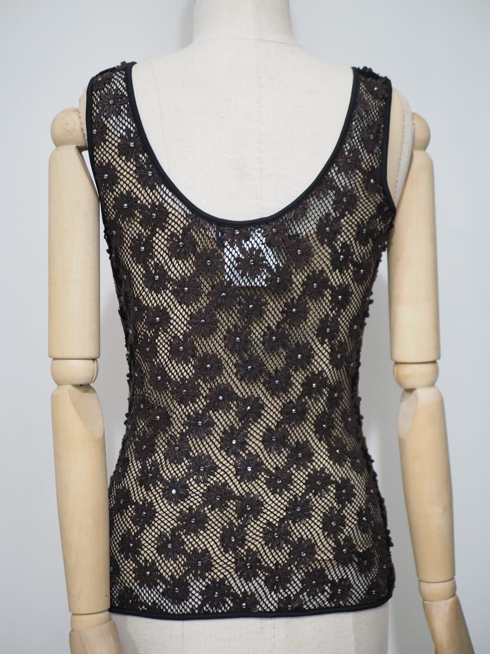 Chanel black flowers top embellished with Swarovski stones
Totally made in Italy in size 36