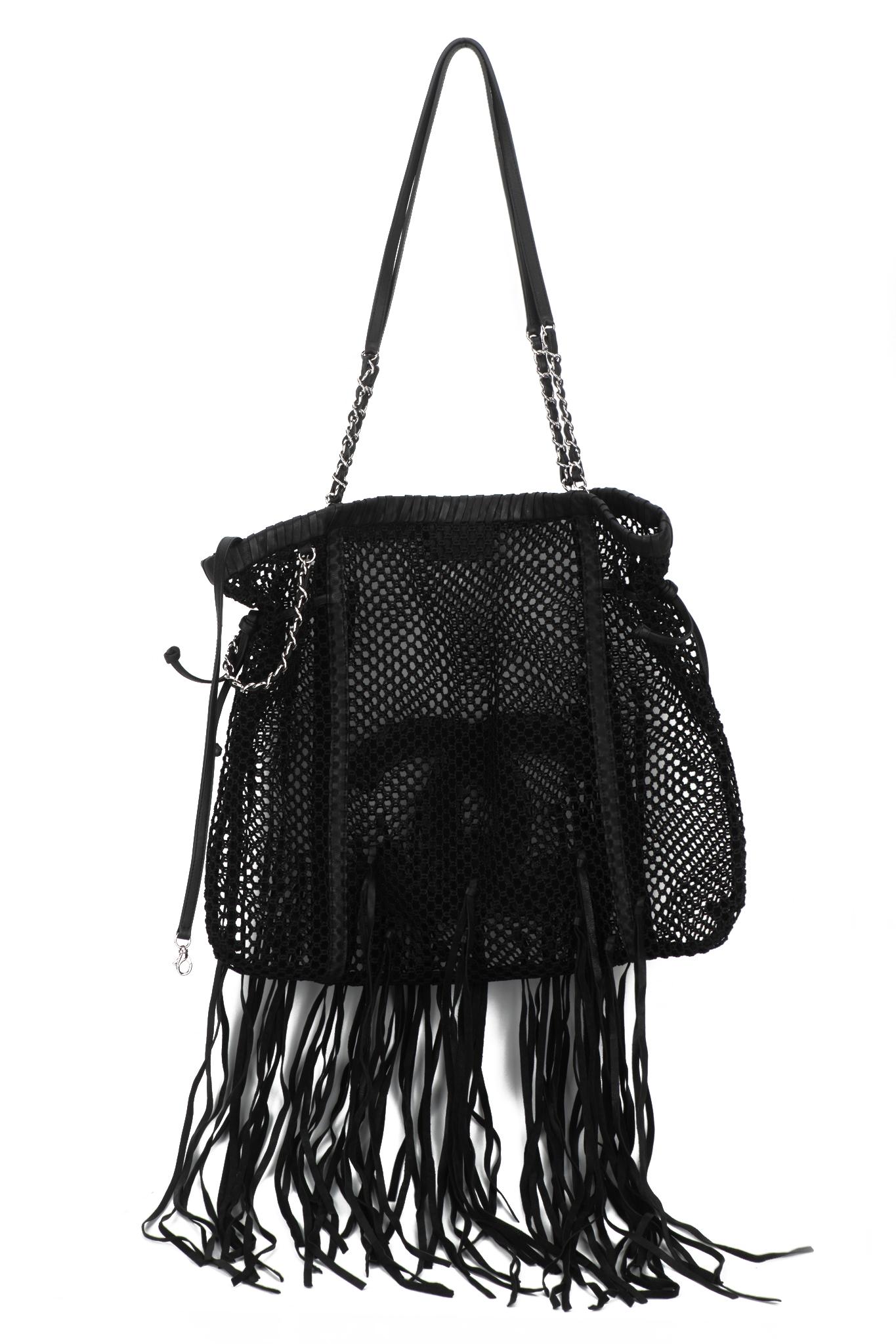The Chanel Fringe CC Tote Handbag features a crochet nylon fabric, a large CC logo in leather and long fringe detail and silver metal chain shoulder straps.
Collection 13, resort limited edition. 
Handles drop14