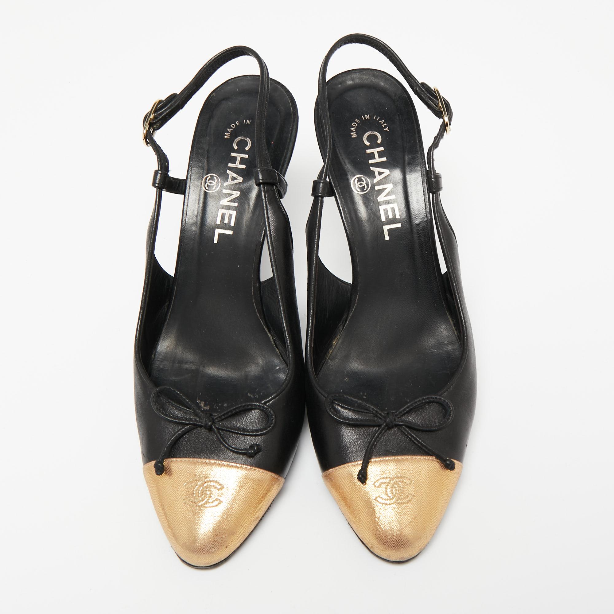 This timeless pair of sandals from Chanel looks even better on the feet. The shoes have an elegant design made from black leather, with gold cap toes, 8.5 cm heels, and buckle slingbacks added for a sleek finish.

