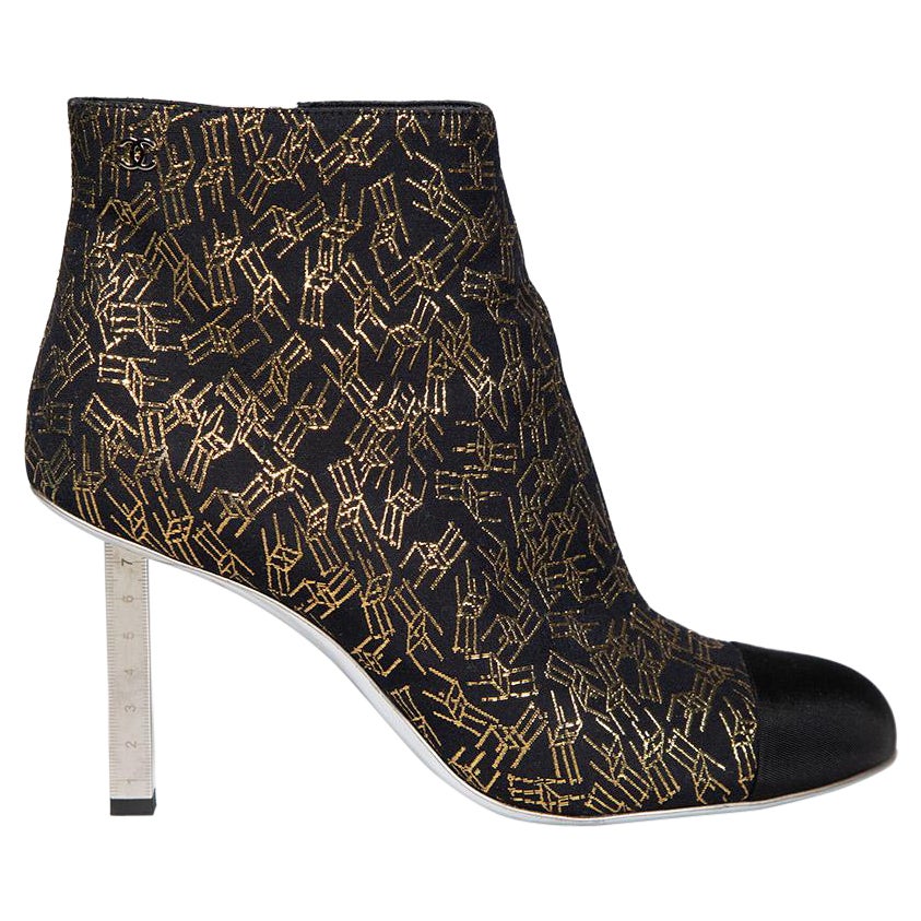Chanel Black 
Gold Patterned Ruler Heel Boots Size IT 39.5