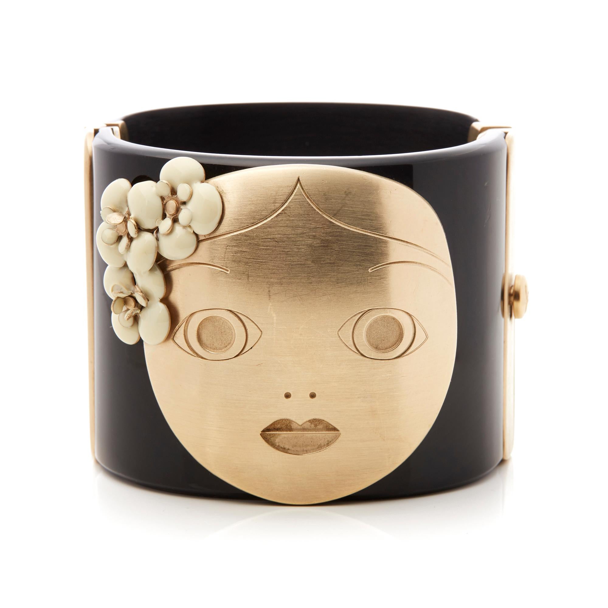 Code: COM2183
Brand: Chanel
Description: Black & Gold Tone Matryoshka Doll Cuff Bracelet
Accompanied With: Presentation Box
Gender: Ladies
Bracelet Length: 18cm
Bracelet Width: 5.2cm
Clasp Type: Slide Lock
Condition: 8
Material: Yellow Gold
Total